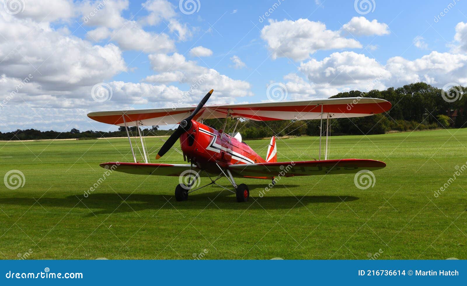 Vintage Stampe SV.4C, G-HJSS 1101 Biplane on Airstrip Grass with Blue Sky  and Clouds Editorial Stock Image - Image of 1101, show: 216736614