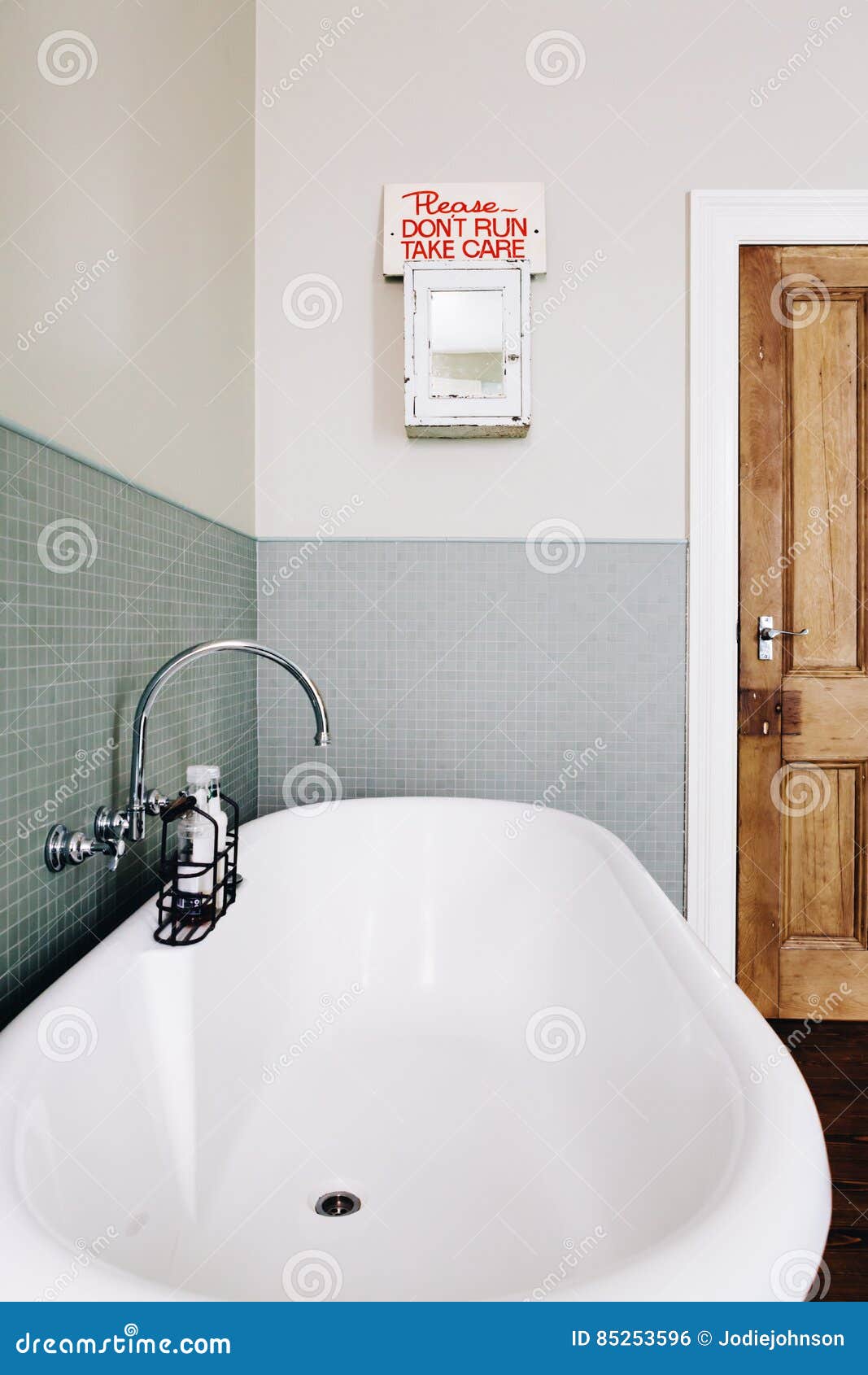 Vintage Style Bathroom With Quirky Retro Safety Sign Stock Photo