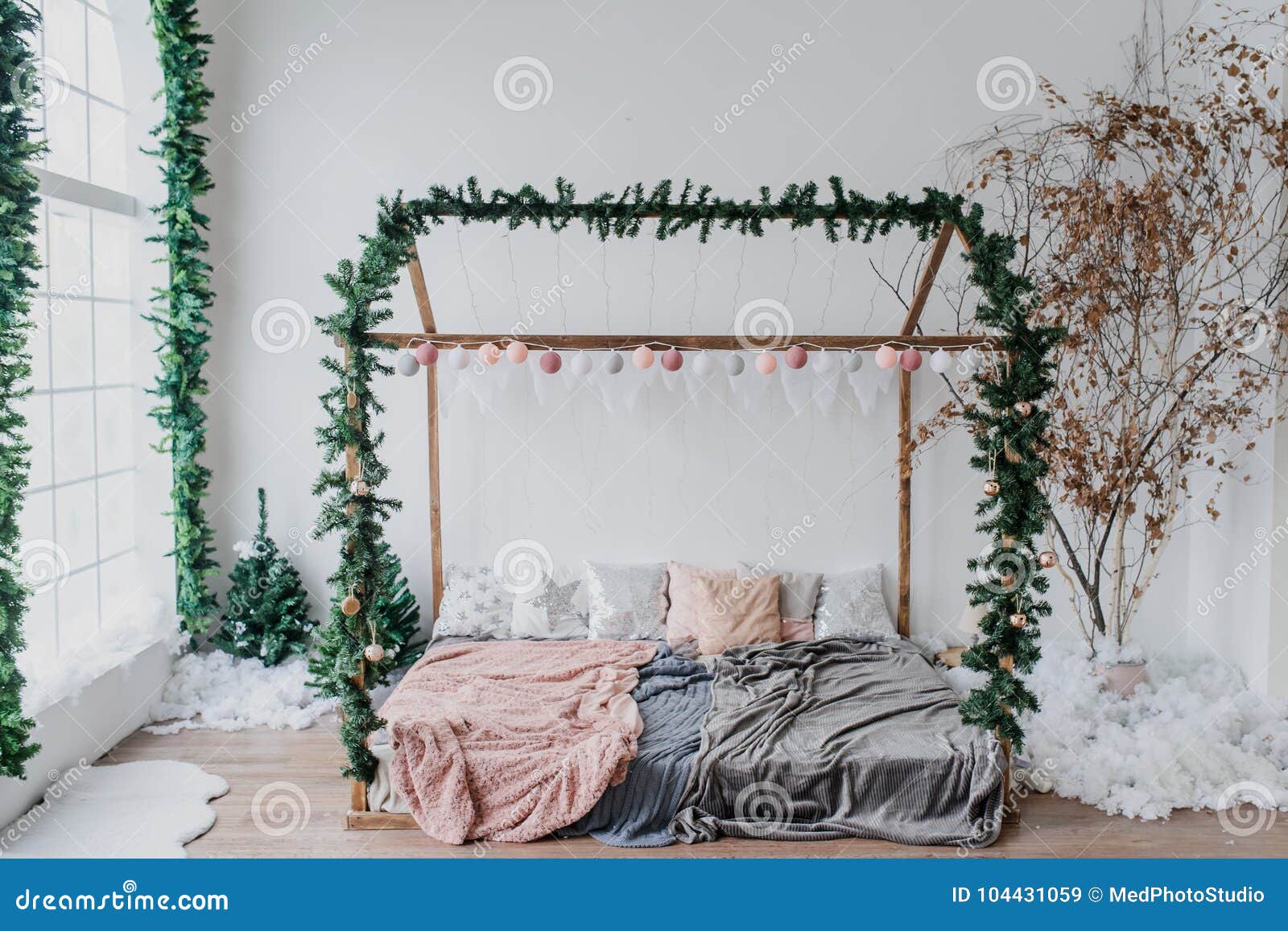 Vintage Style Interior Decorated with Christmas Tree Bed Stock Image