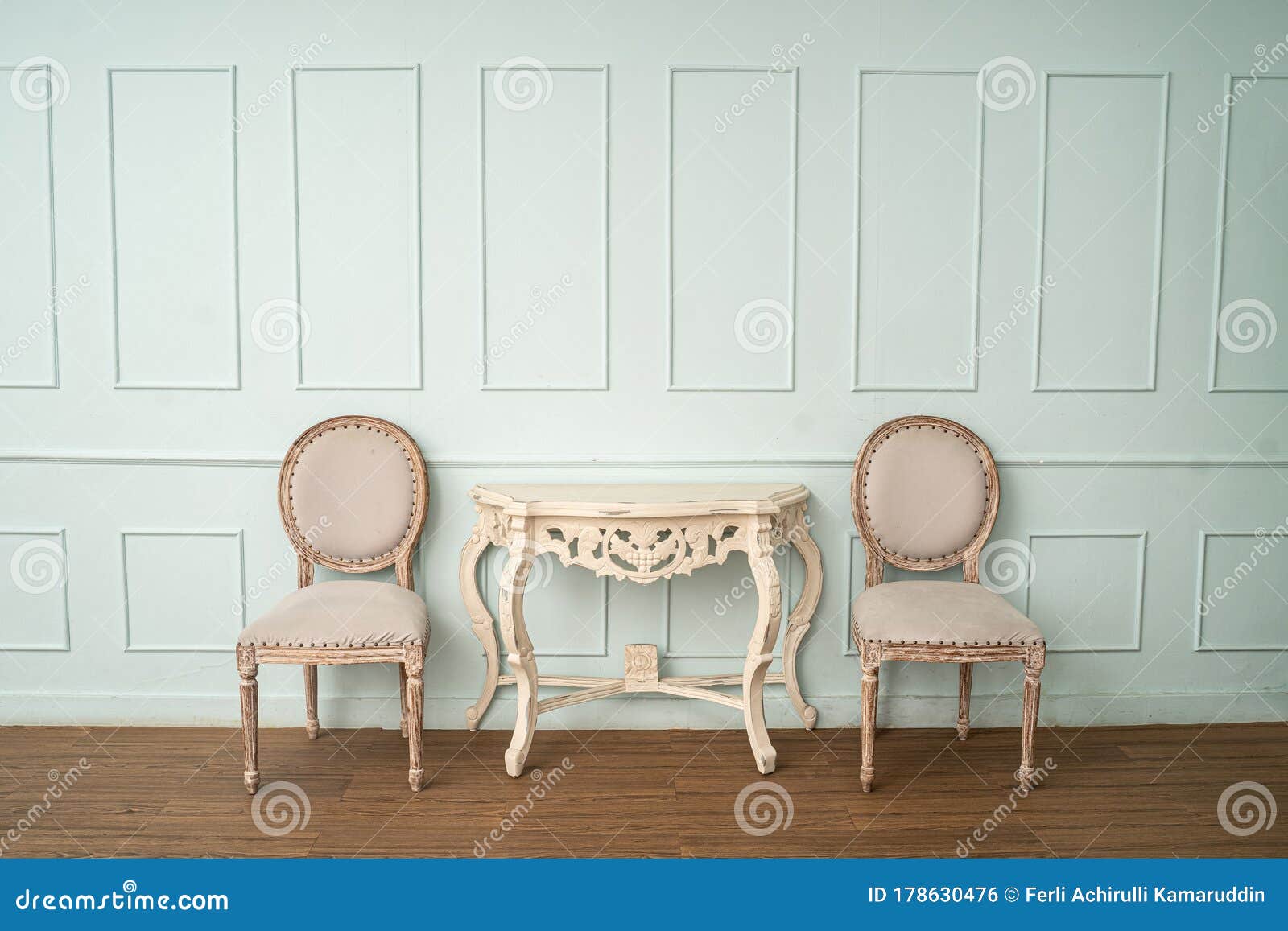 Vintage Style Table and Chair on Light Green Wall Stock Photo Image