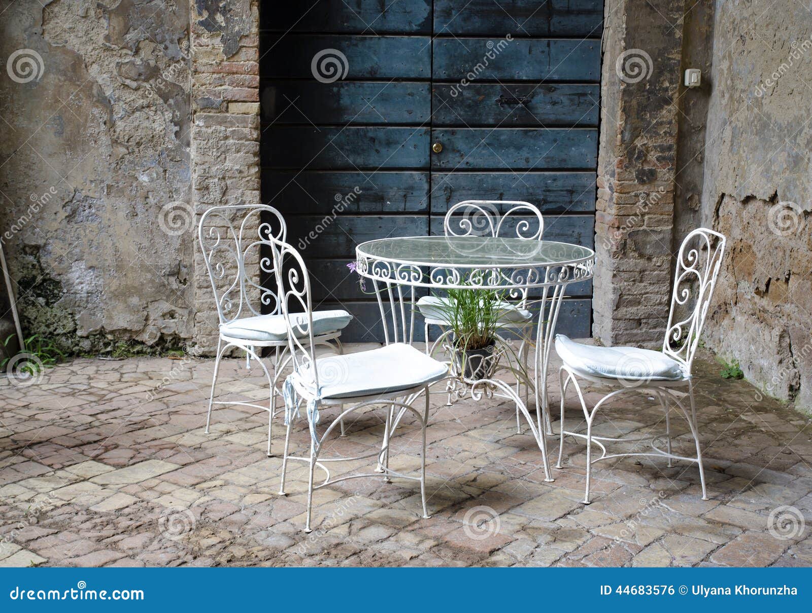 Vintage table and chairs stock photo. Image of flower 44683576
