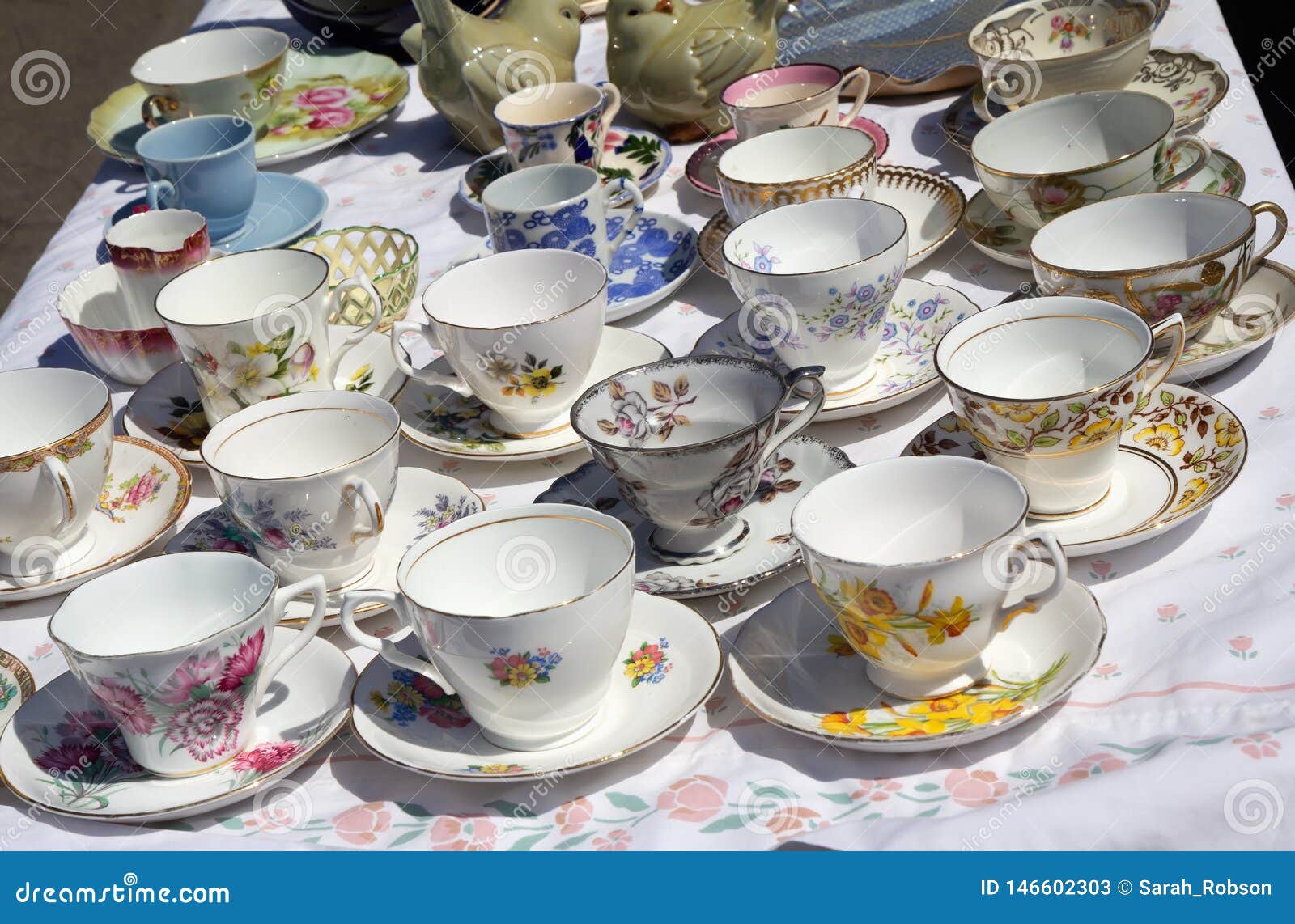 Vintage Porcelain Tea Cups with Saucers at Flea Market Stock Image
