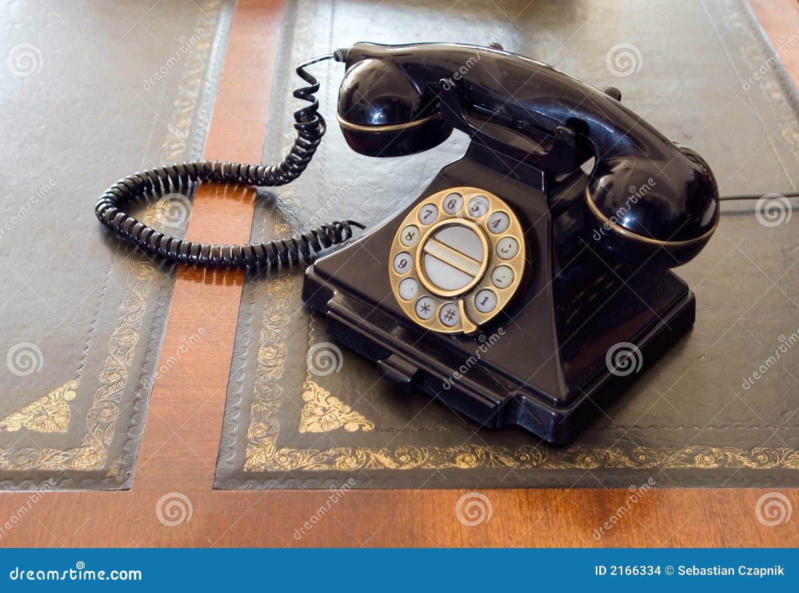 vintage telephone on desk.