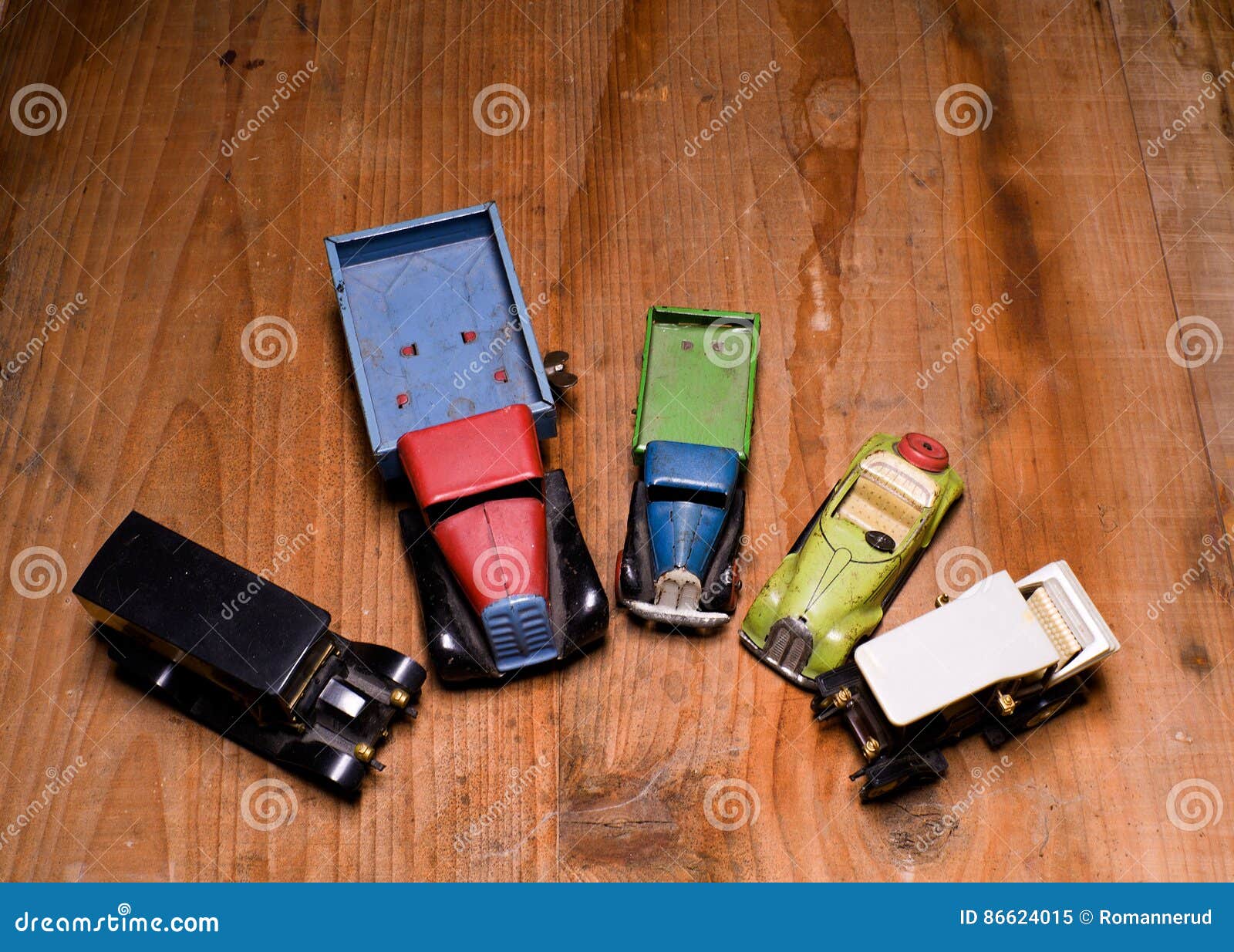 Vintage Toy Cars Lorry Truck And Convertible Car On Brown Wooden Background. Retro Toys For Boys