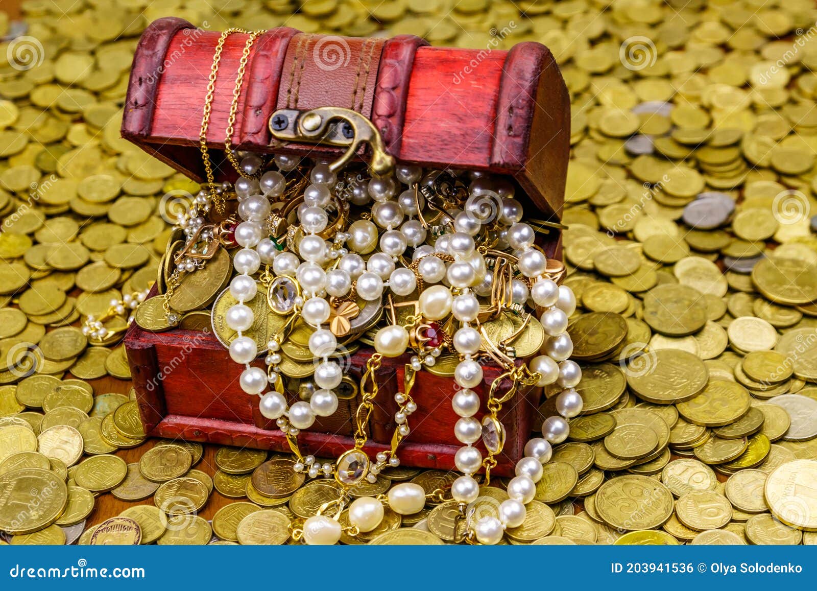 Vintage Treasure Chest Full Of Gold Coins And Jewelry On A Background ...