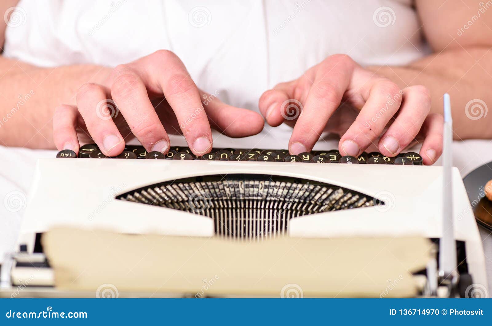 vintage typewriter concept. hands typing retro writing machine. old typewriter and authors hands. male hands type story