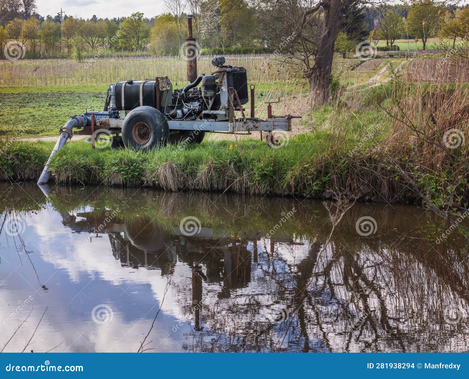 Vintage Water Pump at a River Stock Photo Image of engine, historic