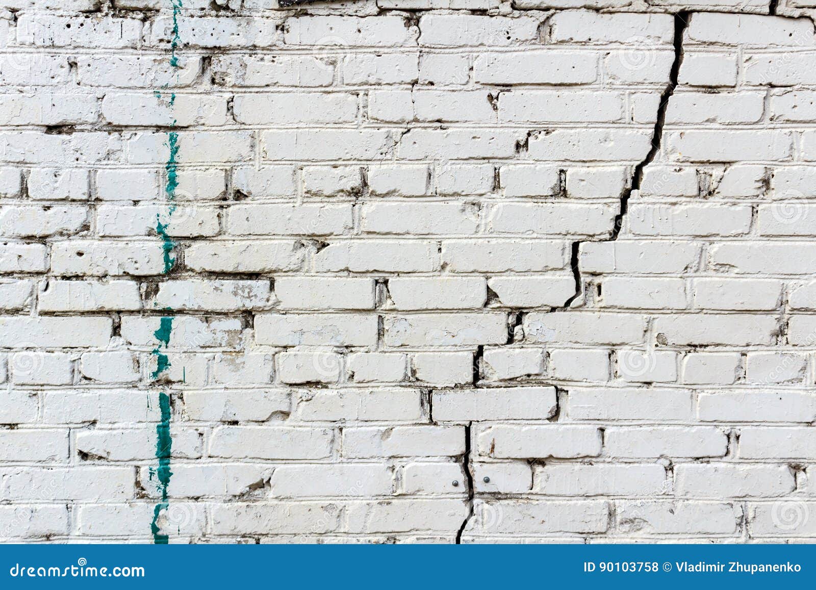 Deep Crack In A Damaged Old Stone Wall Cause Due To Subsidence Of
