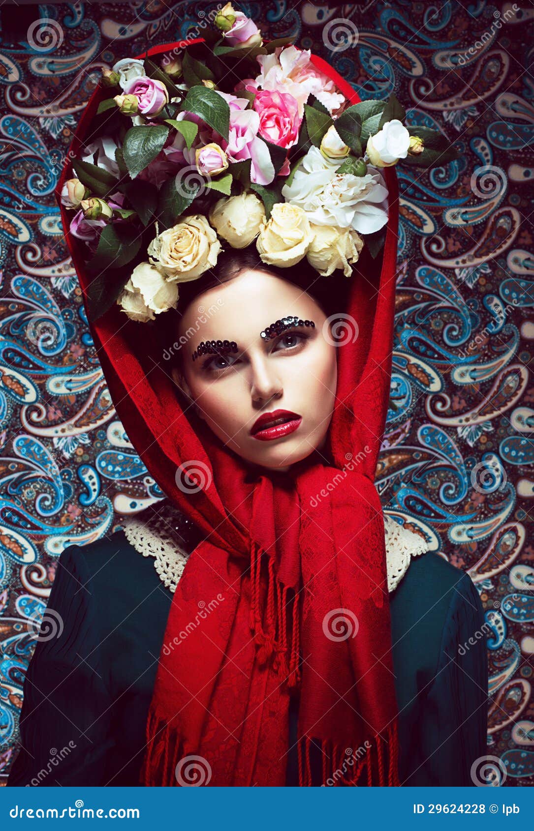 vintage. woman in red shawl and wreath of roses. retro