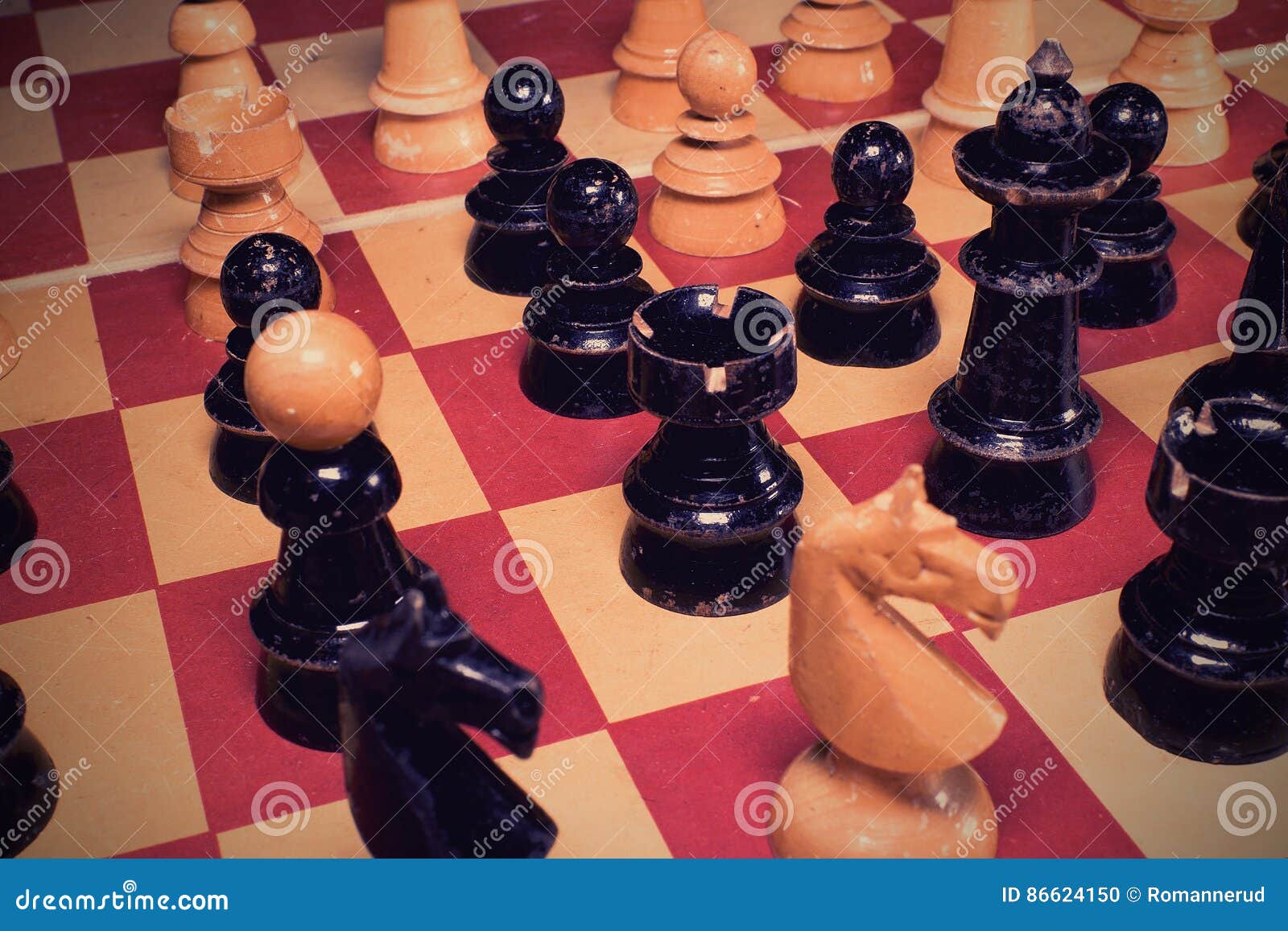 Vintage Wooden Chess Pieces. Retro Effect with Shadow Tint. Stock Photo