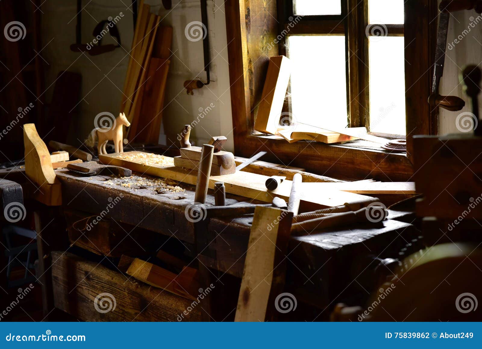 Vintage Wooden Drawing Desk In Carpenter Workshop At Window Stock