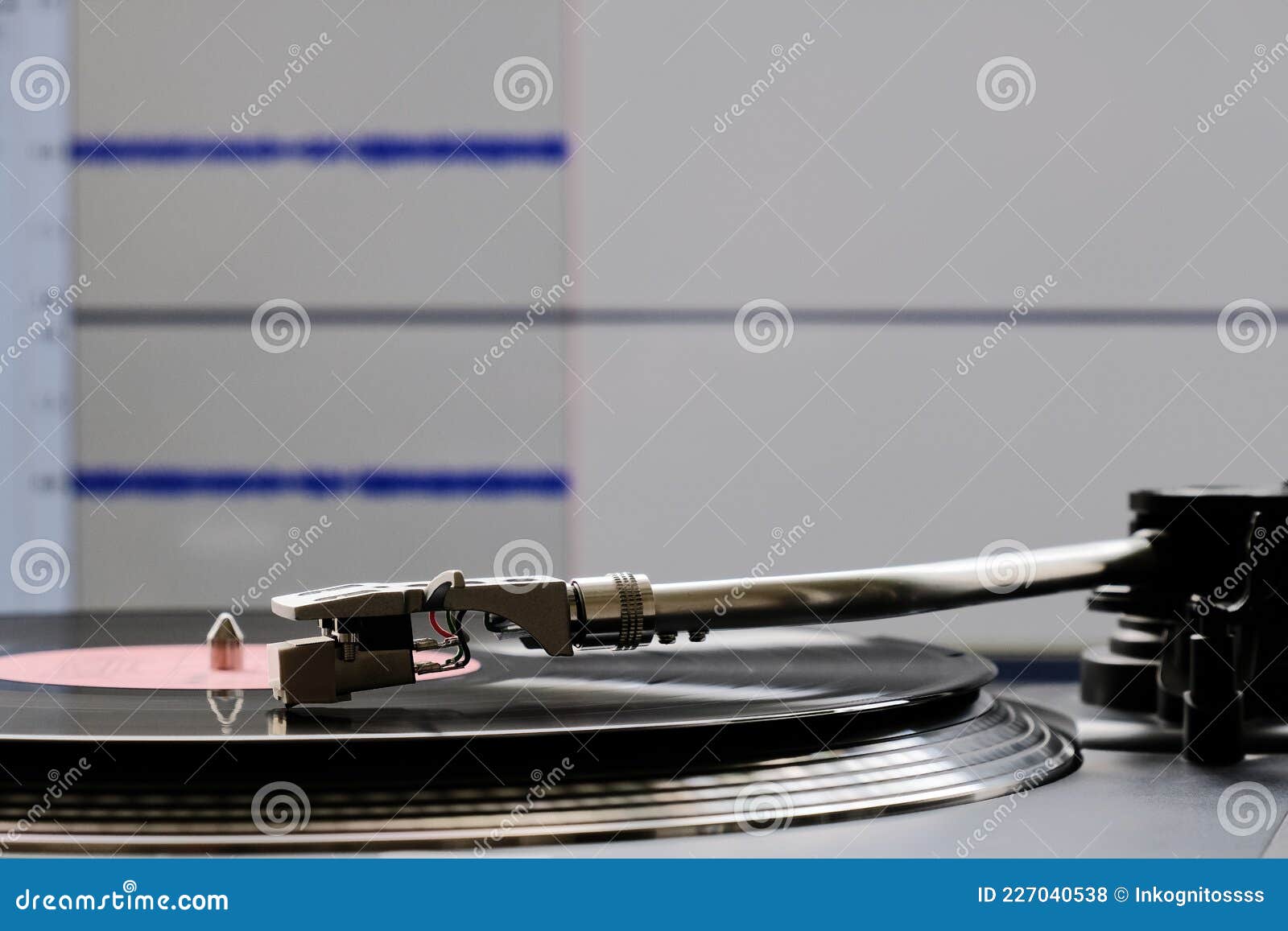 Vinyl Record and Turntable during Analog To Digital Audio Conversion