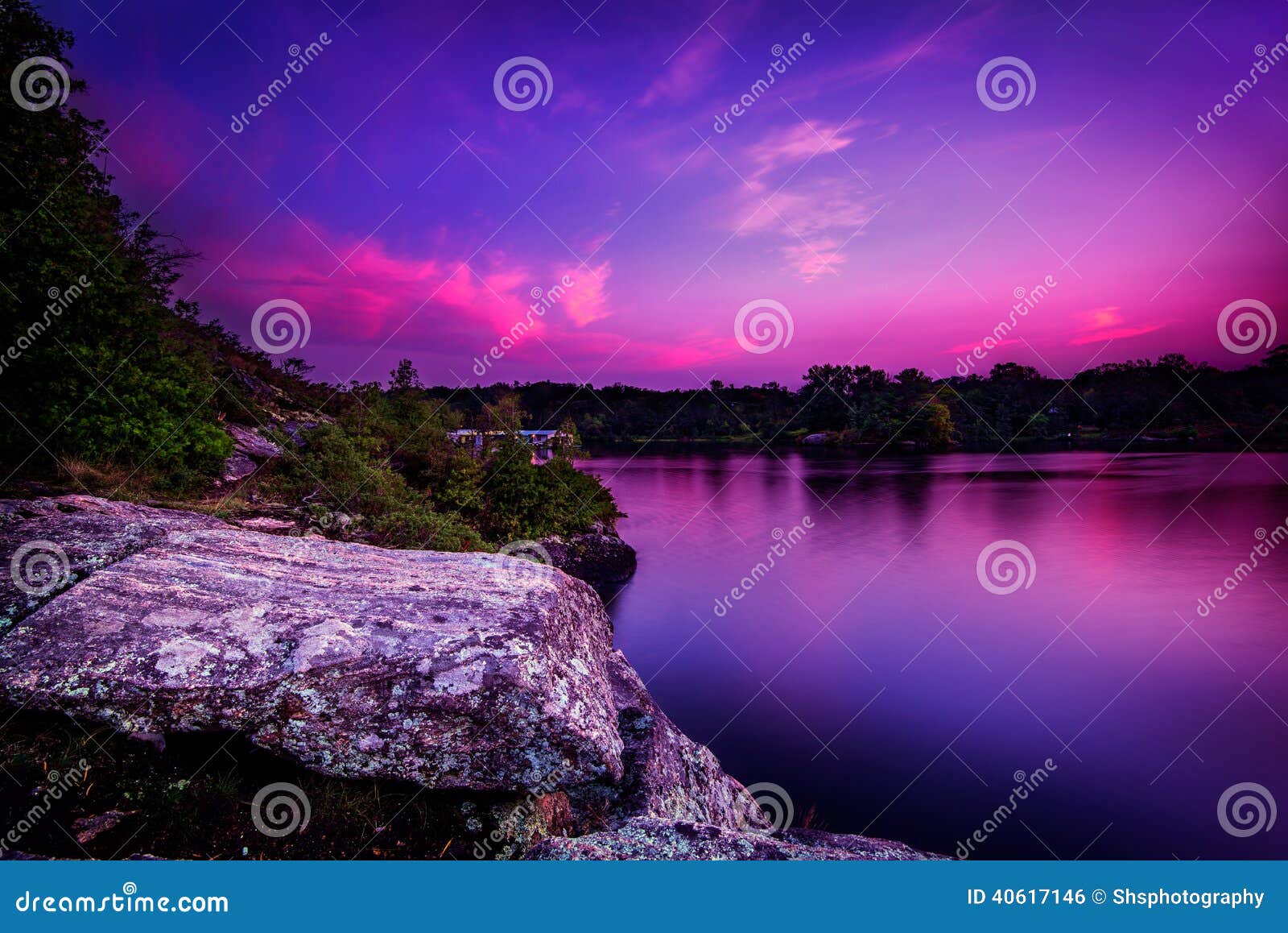 violet sunset over a calm lake