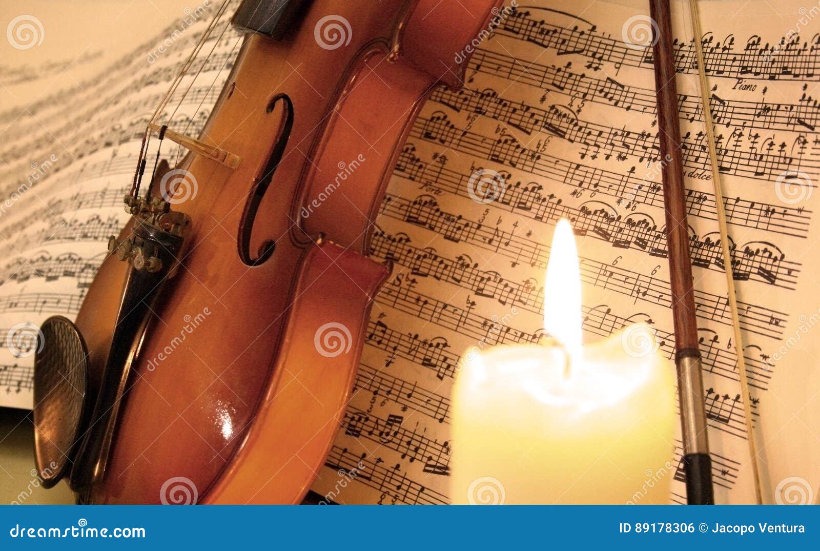 Violin on Music Sheet Behind a Candle Stock Photo Image of love