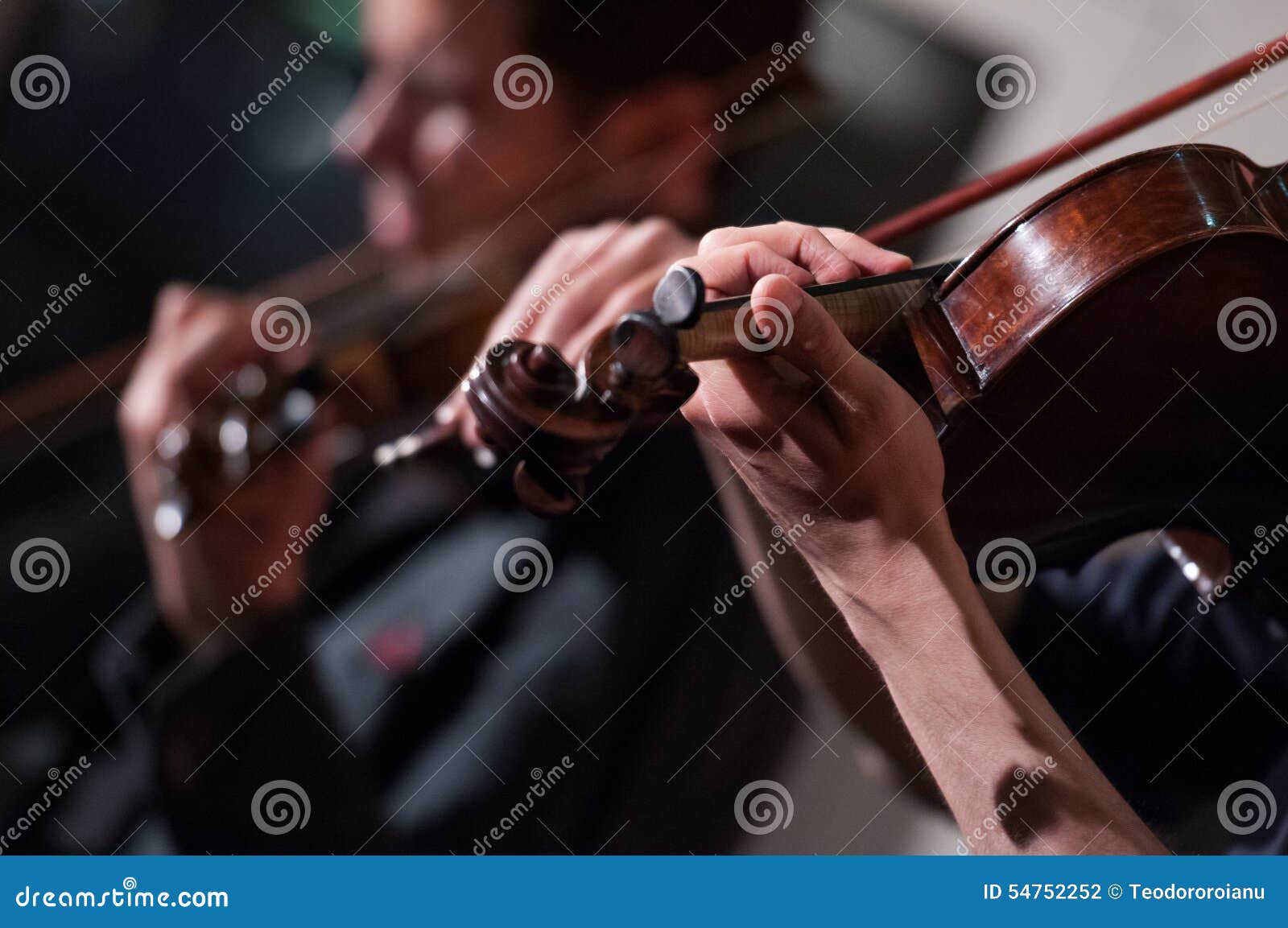 Violins in concert stock photo. Image of gigs, instruments 54752252