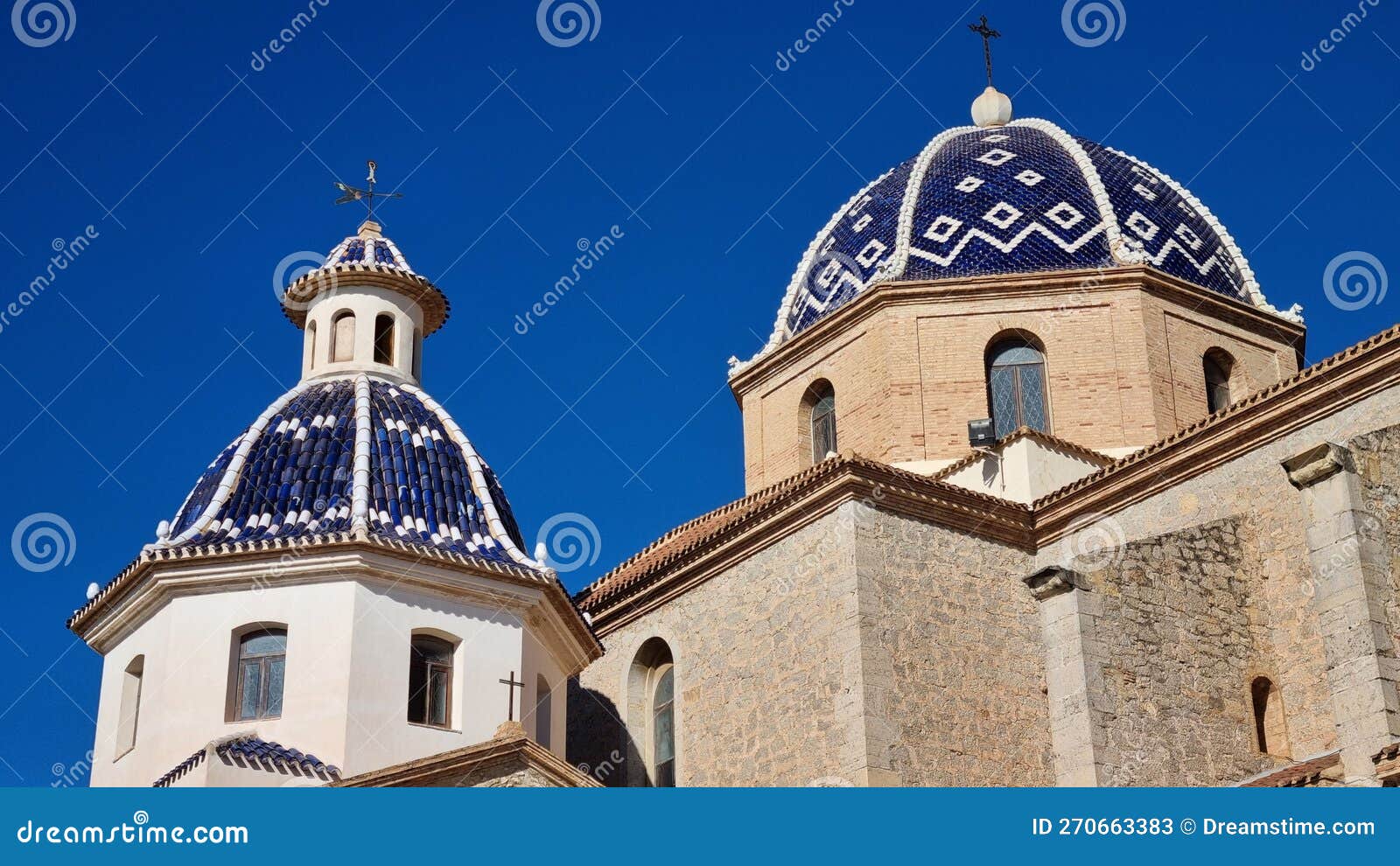 virgin of the consol church in altea, spain
 against a backdrop of the blue sky