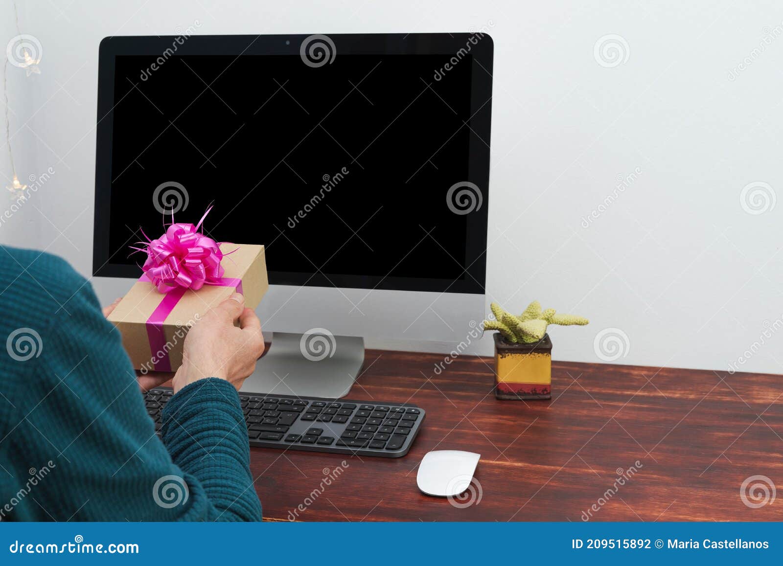 Virtual Gift Exchange. Man Offering Gift in Front of Computer. Moc