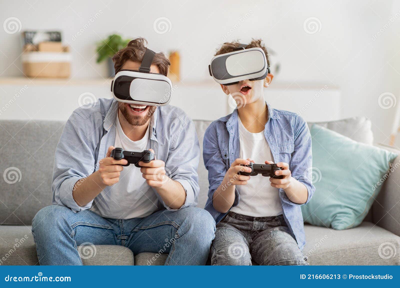 Virtual Reality. Excited Father Teen Son Trying Glasses and Playing Videogames Together Stock Image - Image of electronics, 216606213