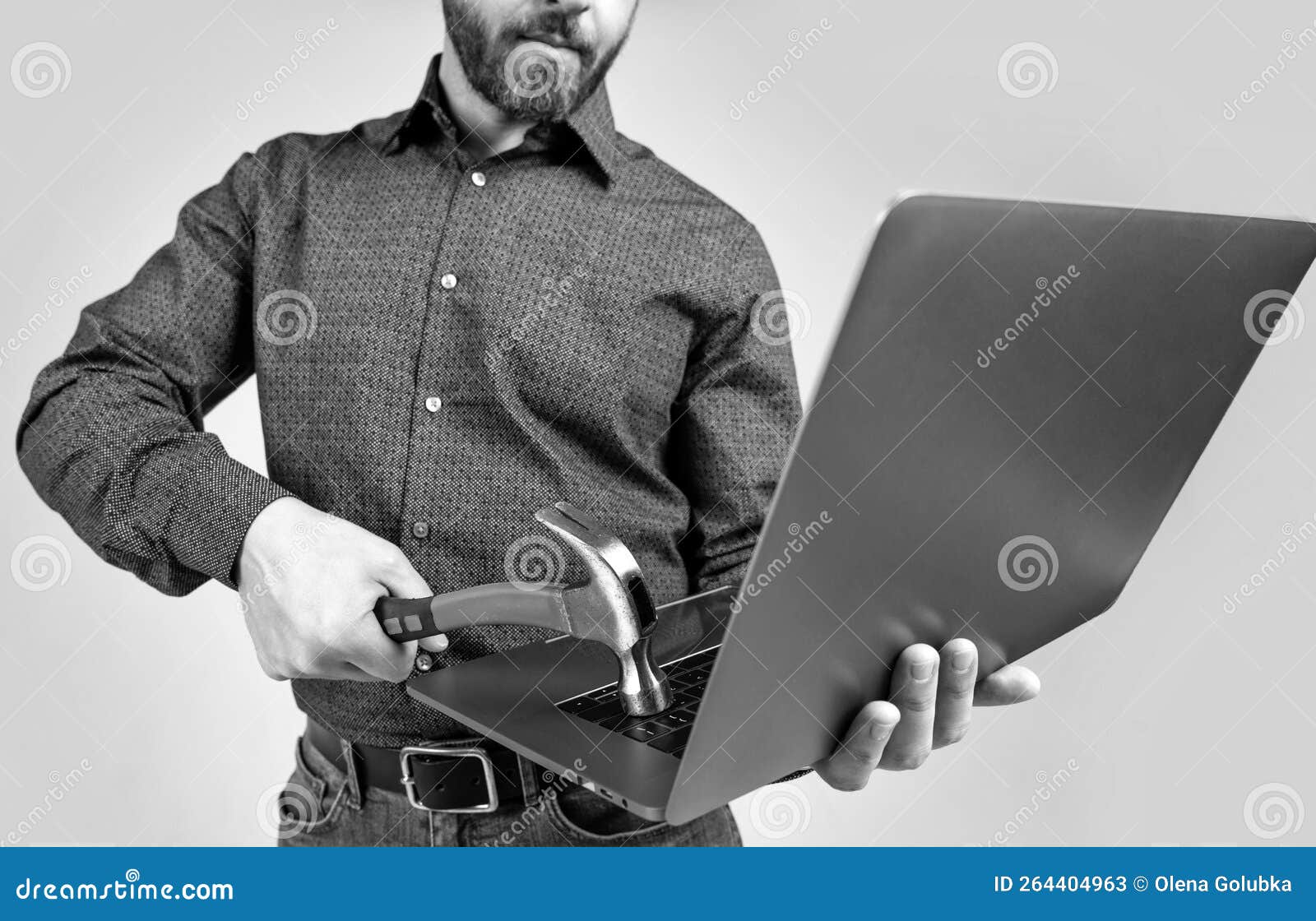 virus attack. man cropped view hit laptop with hammer. virus threat. virus-killing software