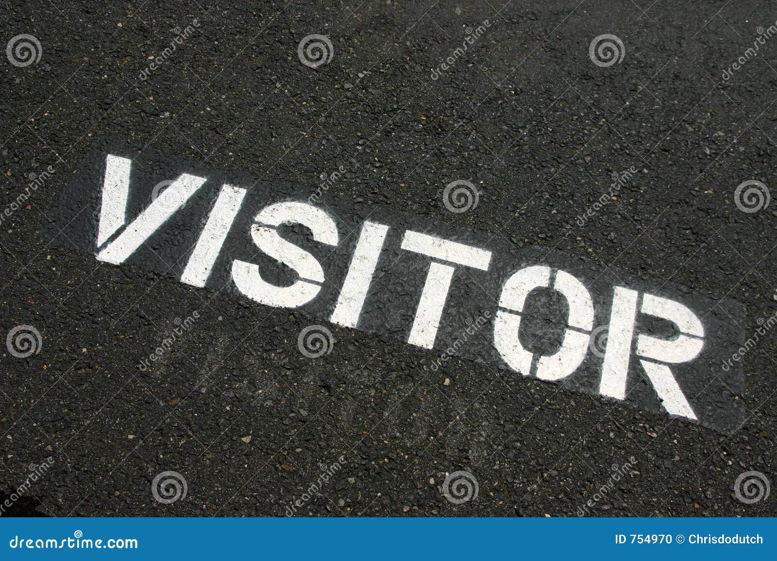 visitor sign on pavement