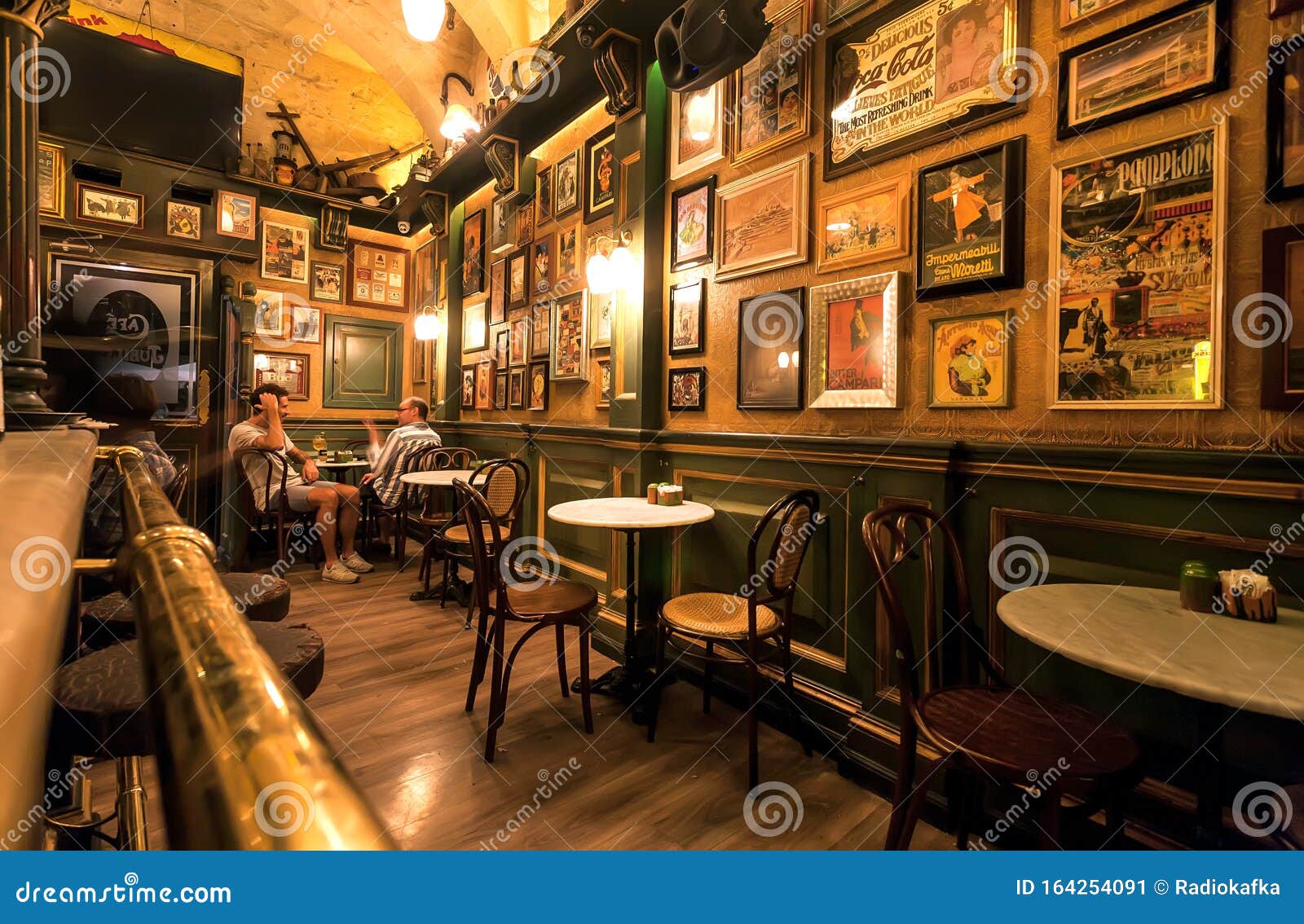 Visitors Of Cozy Restaurant  In British  Retro Style Having 