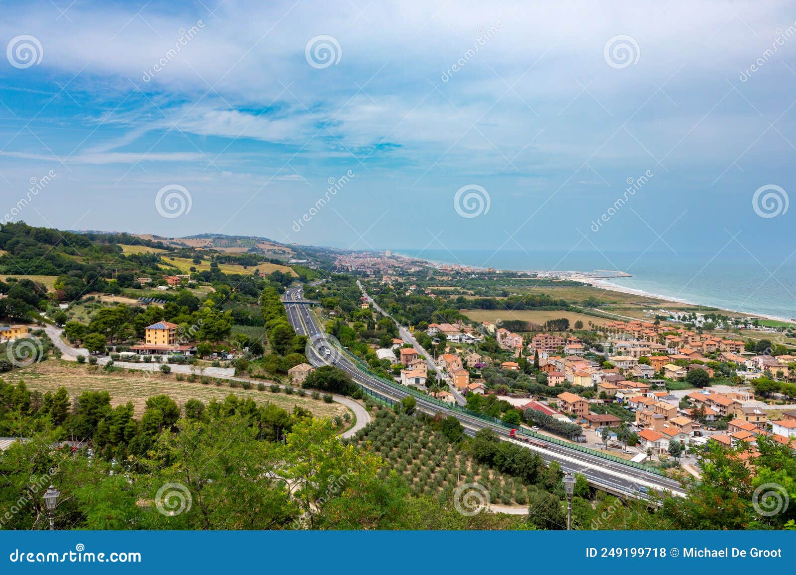 vista from torre di palme to the villages of marina palmense and santa maria a mare, over the e55 highway in marche region in