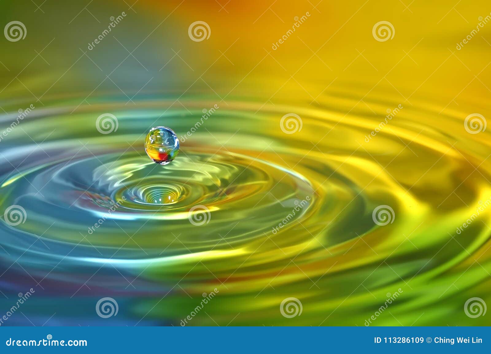 vivid bright colored water drops freeze instantly
