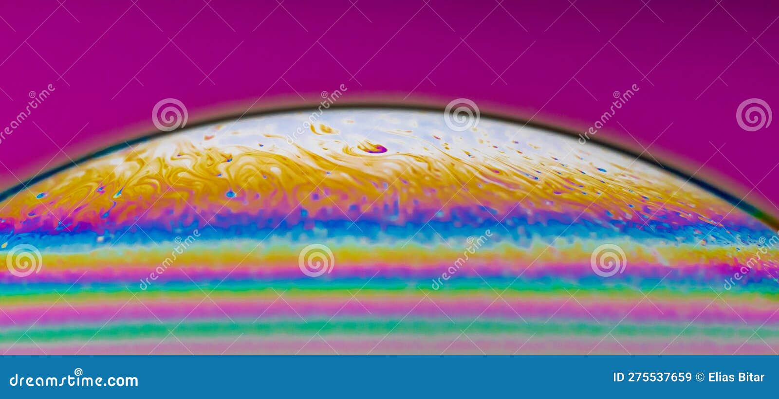 Rainbow Colours of a Macro Soap Bubbles Creating Psychedelic Patterns