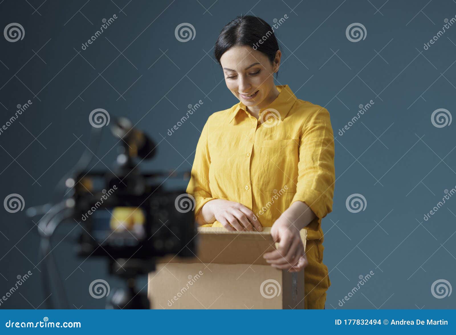 vlogger making an unboxing video for her channel