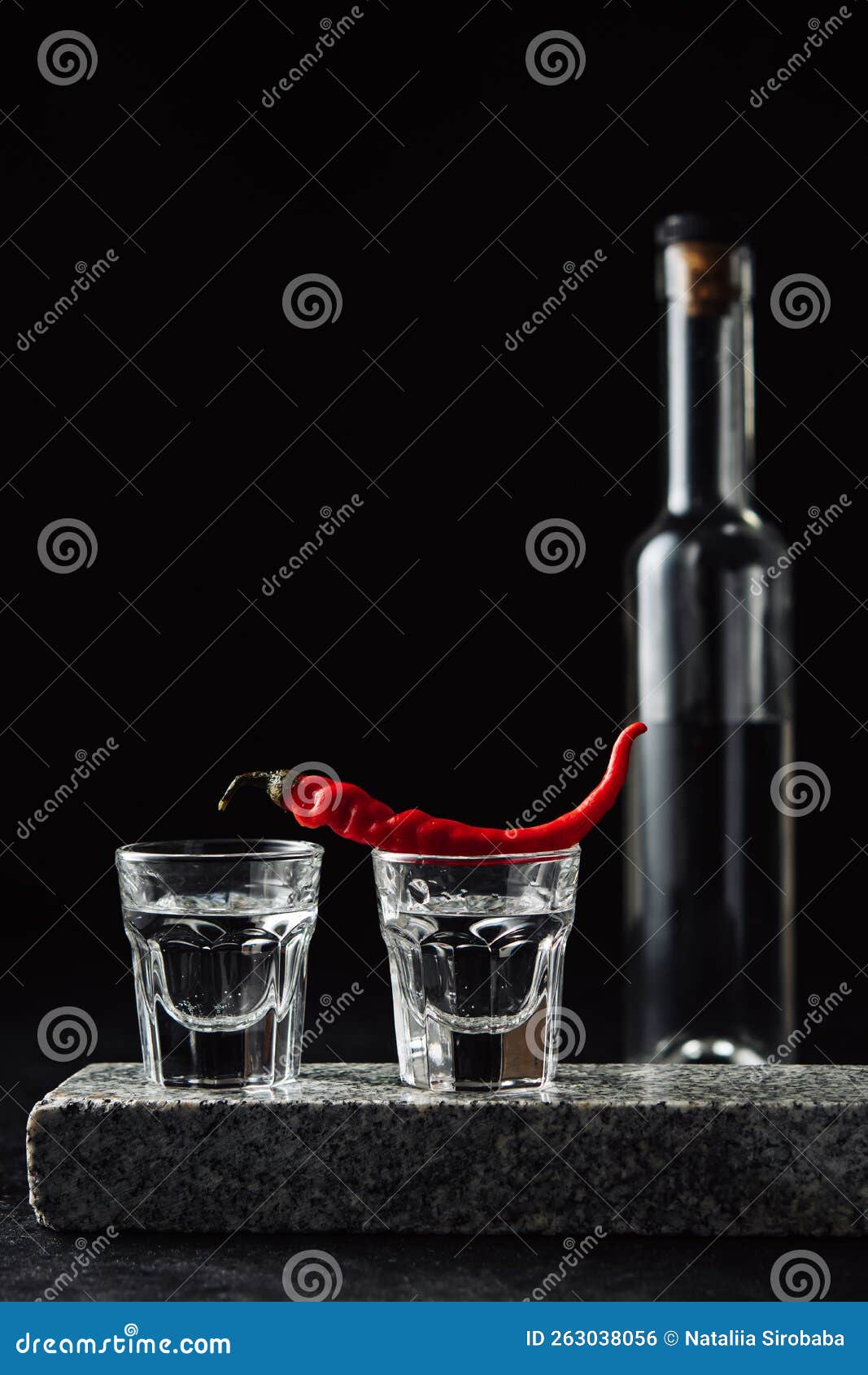 Vodka with red hot pepper stock photo. Image of black 263038056