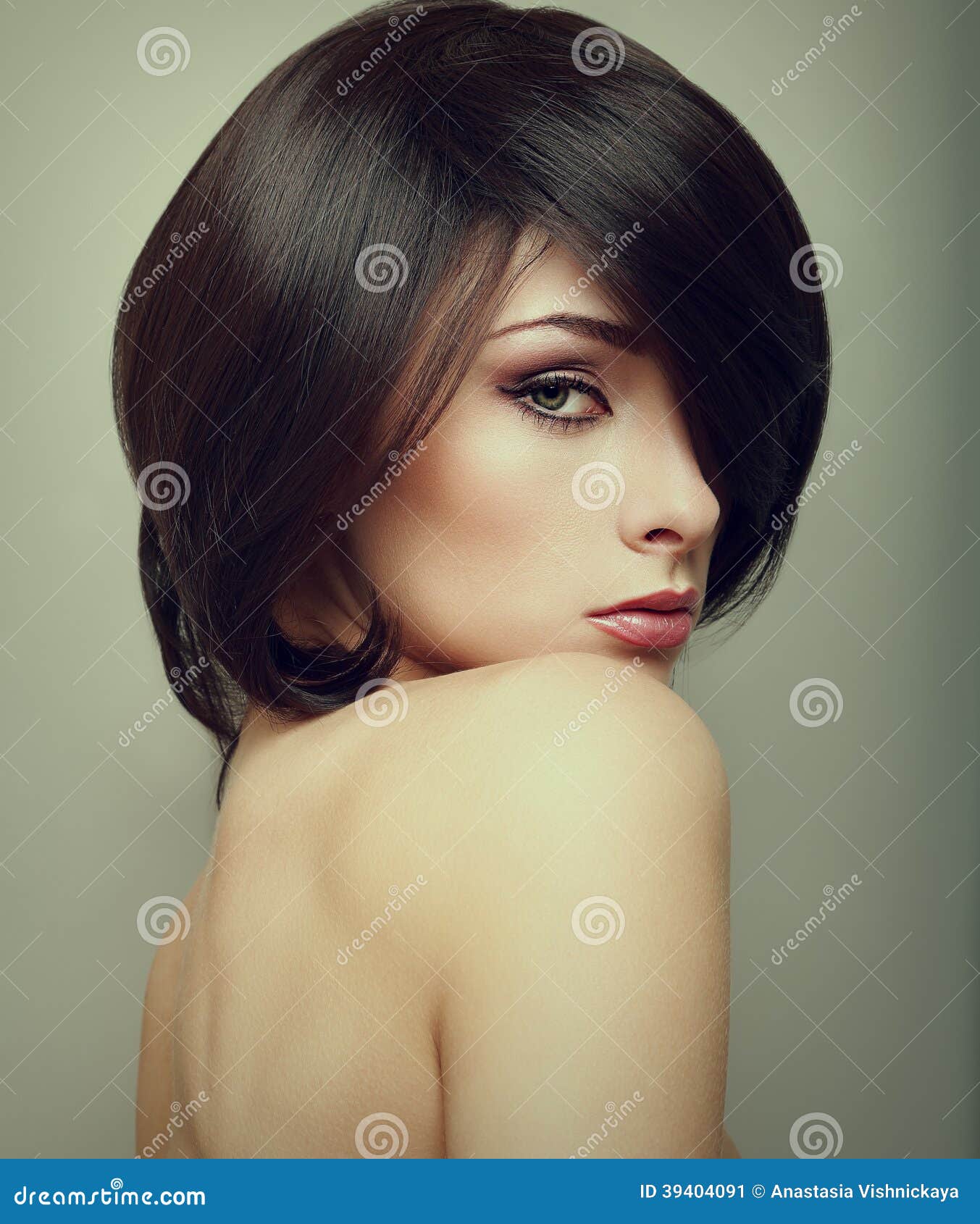 vogue portrait of alluring woman with short hair