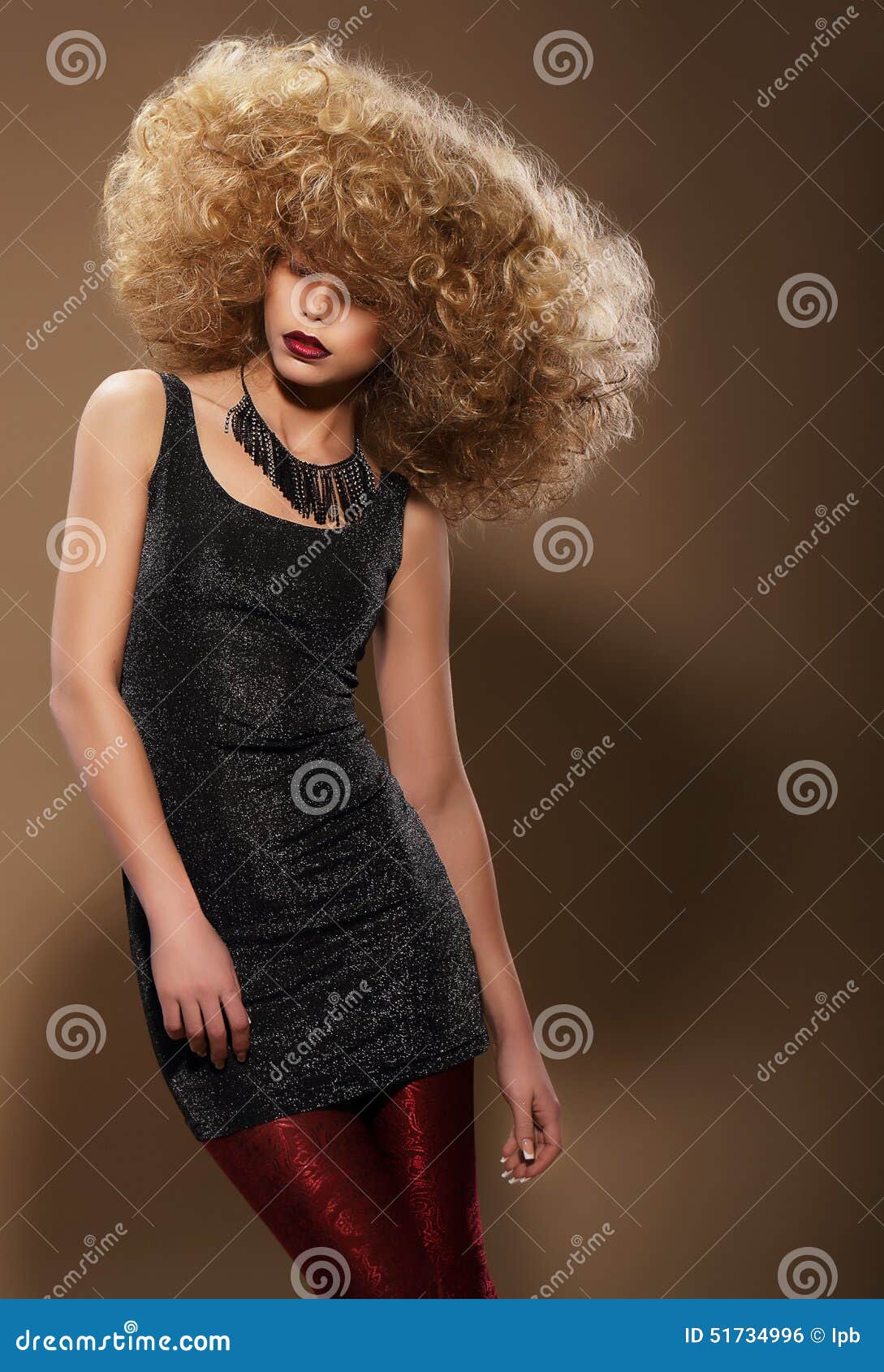 vogue style. stylish woman with extravagant hairstyle