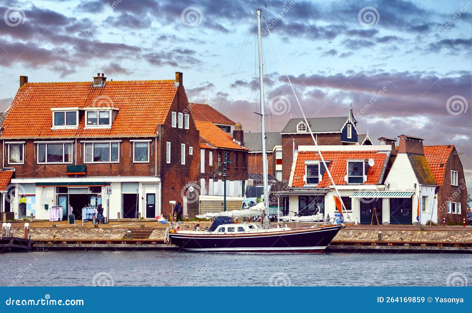 volendam, amsterdam, netherlands. luxury yachts by piers. sea
