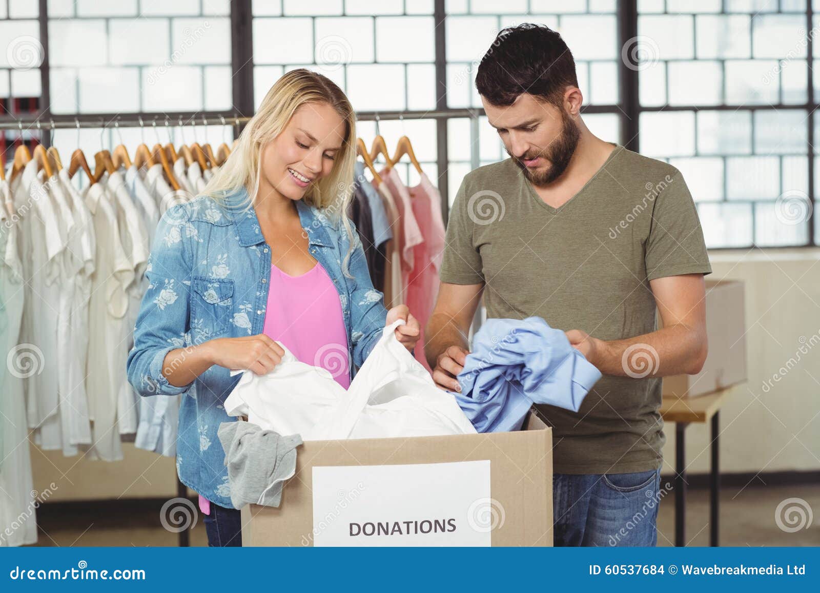 Volunteers Looking at Clothes in Donation Box Stock Photo Image of