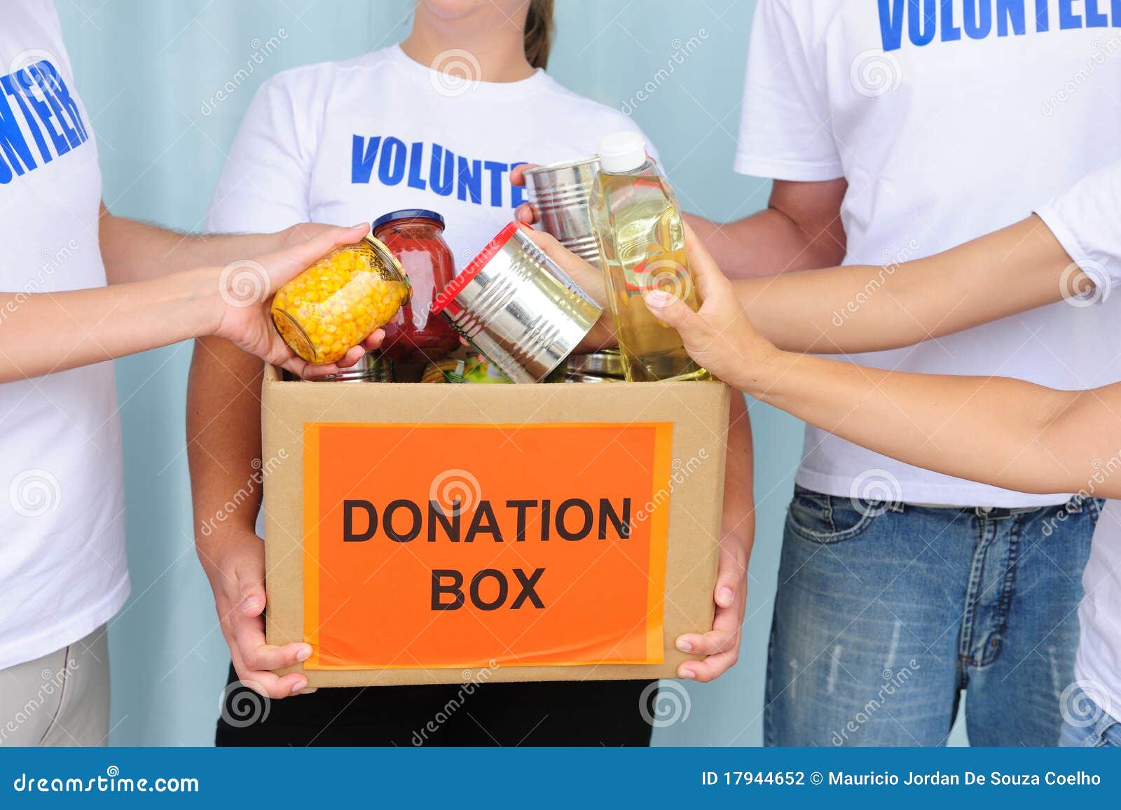 Volunteers Putting Food in Donation Box Stock Photo Image of charity