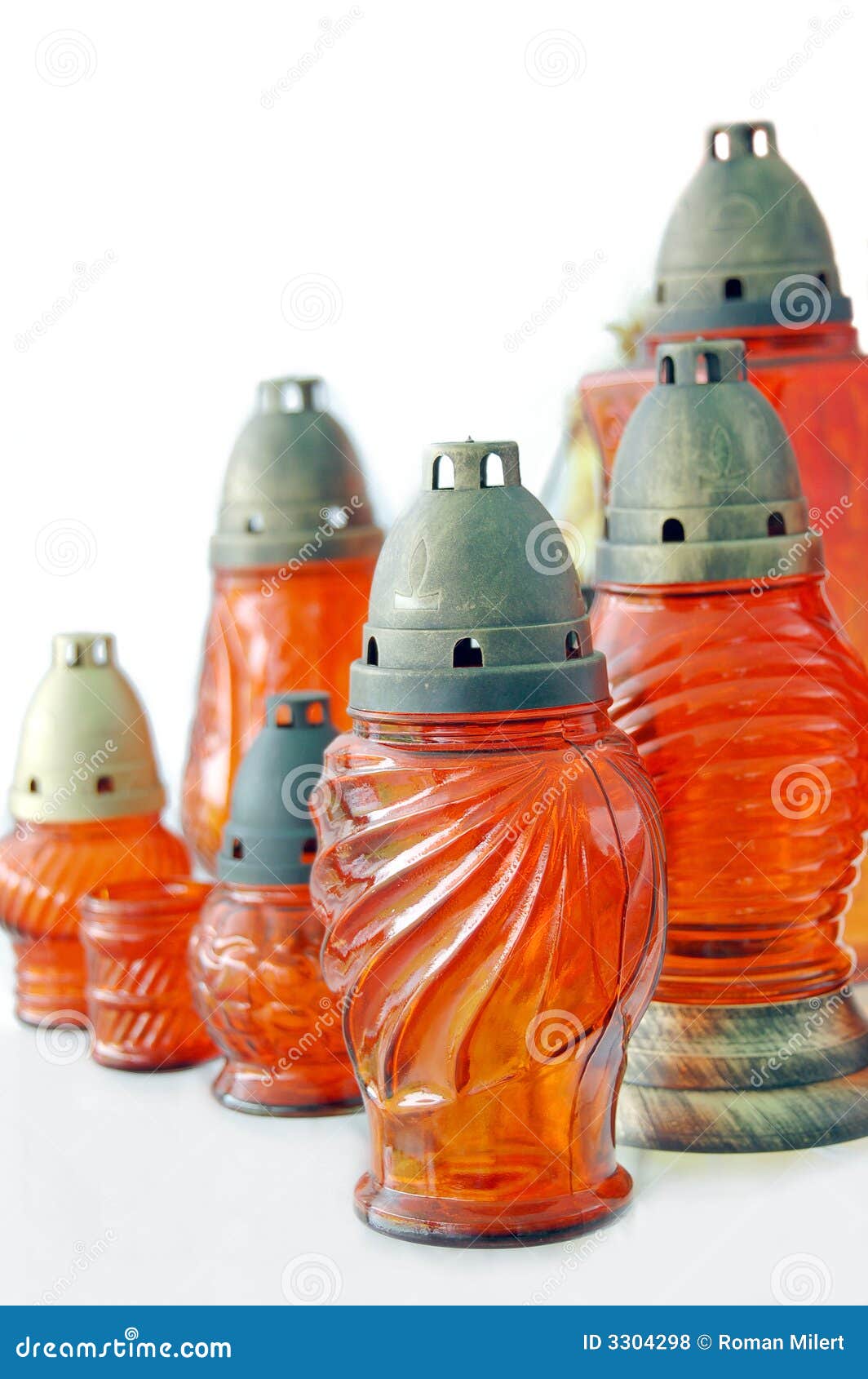 Votive Candles Lantern On The Grave In Slovak Cemetery. All Saints' Day. Solemnity Of All Saints