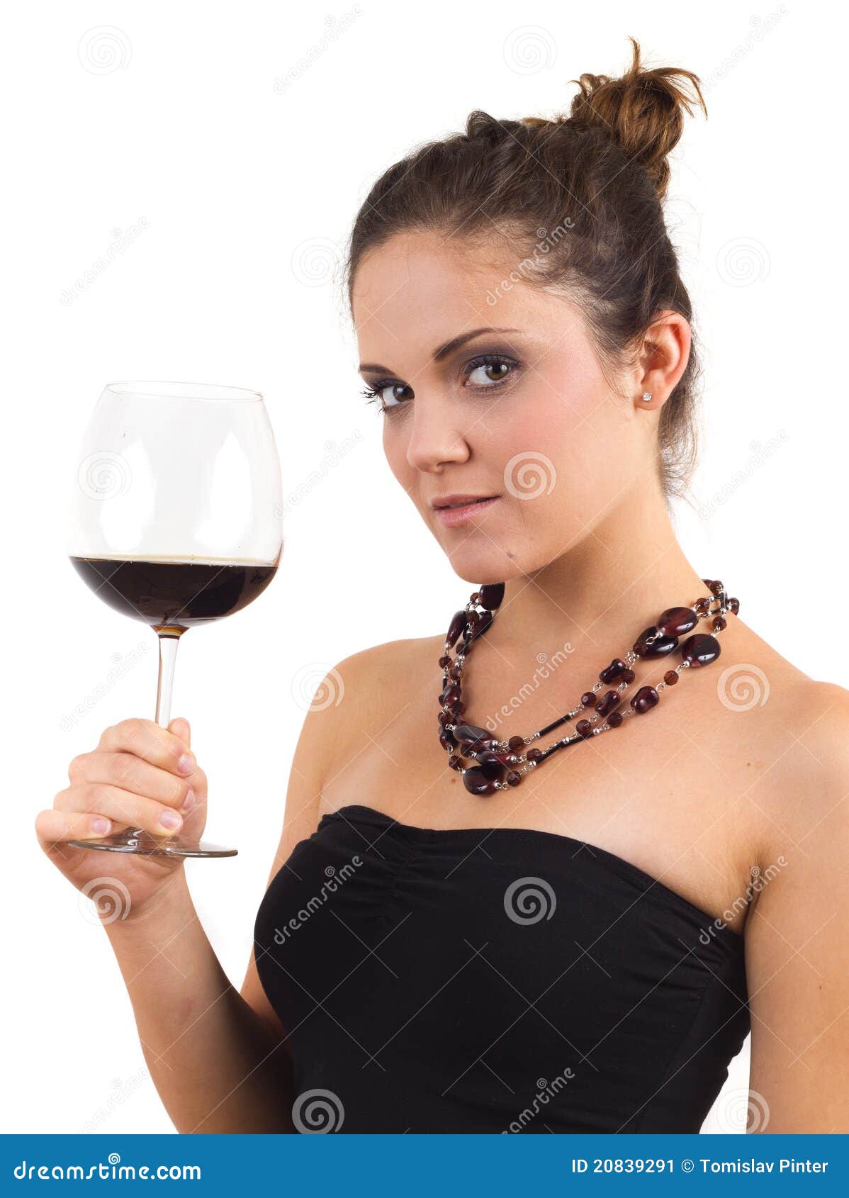 Ontsproten van vrouw die een glas wijn houdt