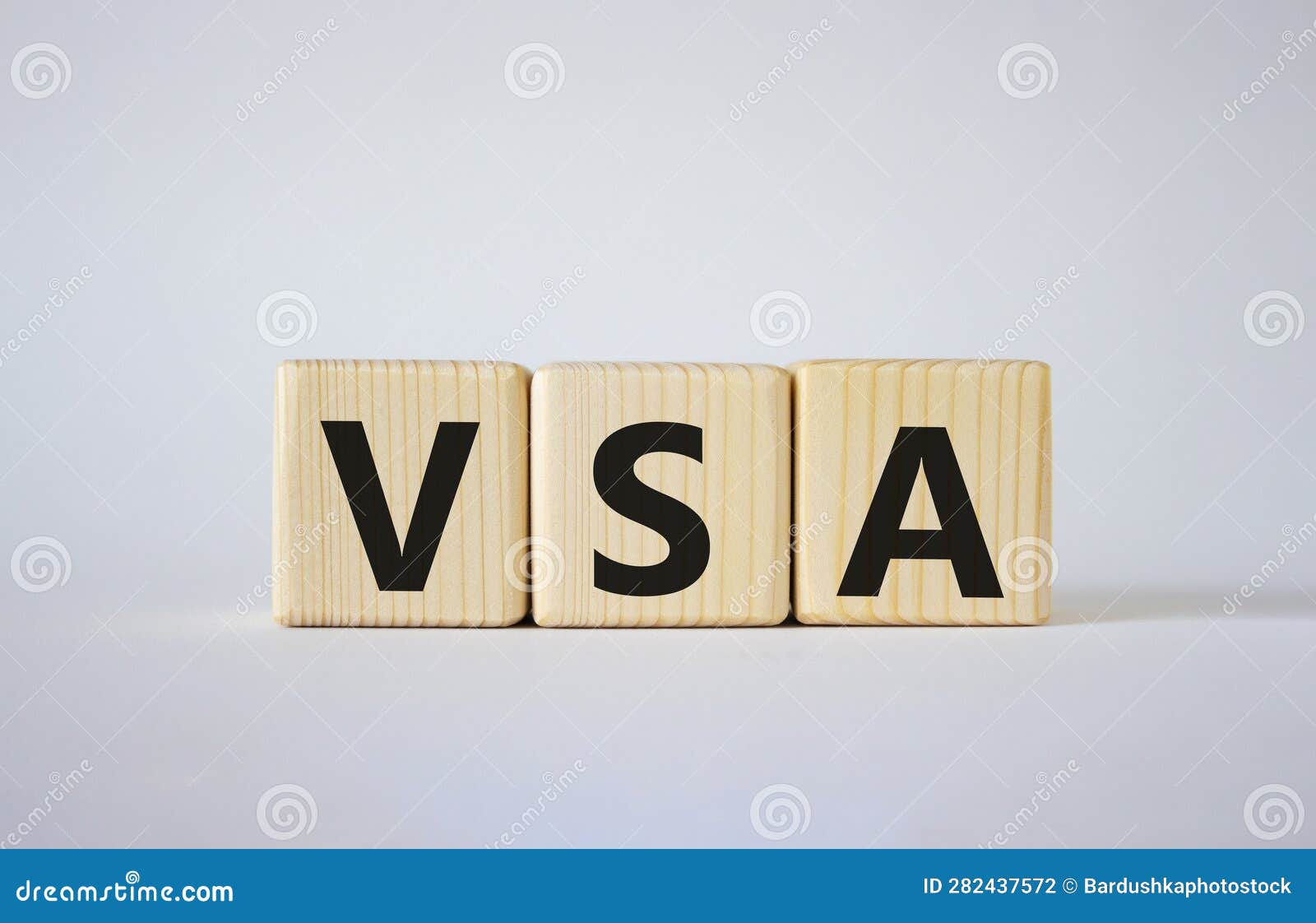 vsa - volume spread analysis . wooden cubes with word vsa. beautiful white background. business and volume spread analysis