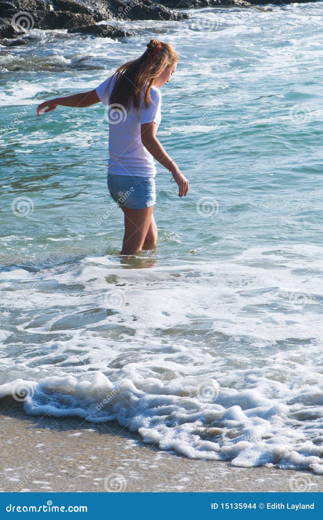 Wading in the Water stock photo. Image of ocean, woman - 15135944