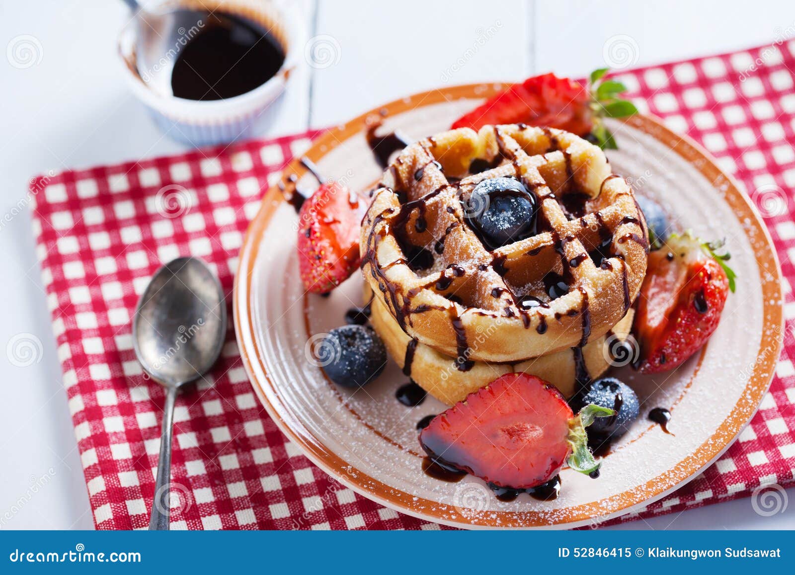 Waffles with Strawberry ,blueberry Poured with Chocolate Stock Image