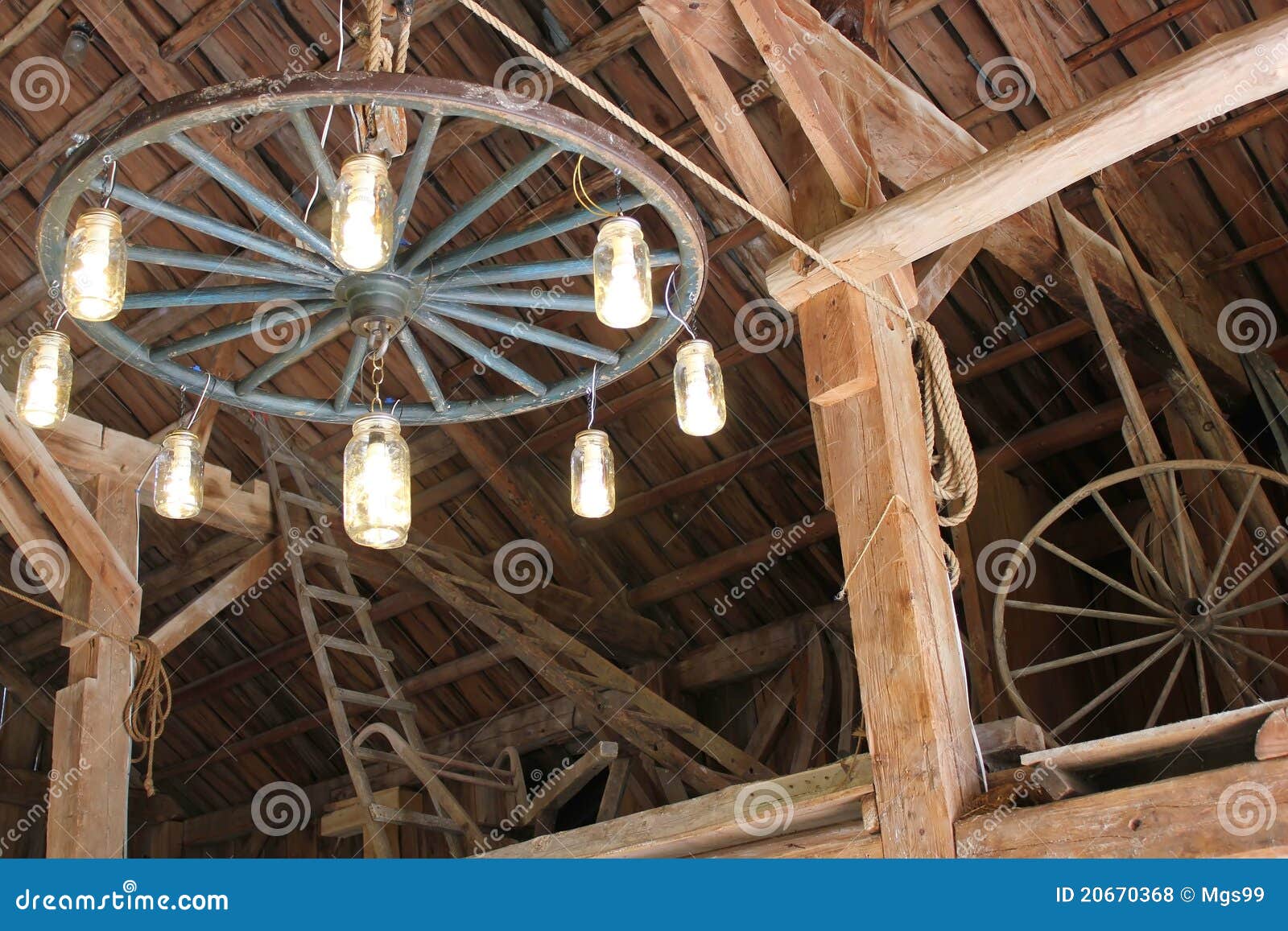Antique Wood Wagon Wheel Hub Old Wooden Spokes Stock Photos Wagon wheel chandelier Royalty Free Stock Photos - Antique Wood Wagon Wheel Hub Old Wooden Spokes Stock Photos