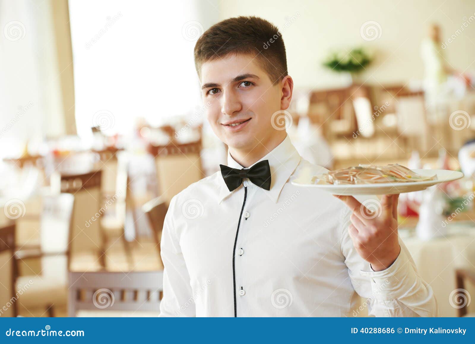 waiter man with tray at restaurant