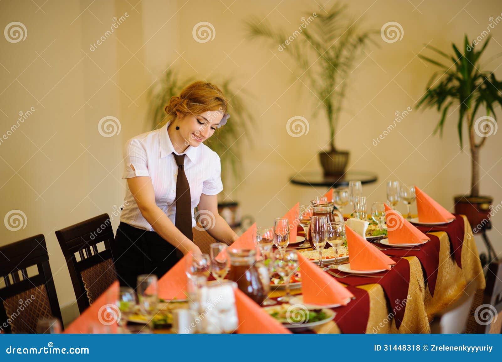 Waiter Near the Table with Food Stock Photo Image of beer, restaurant