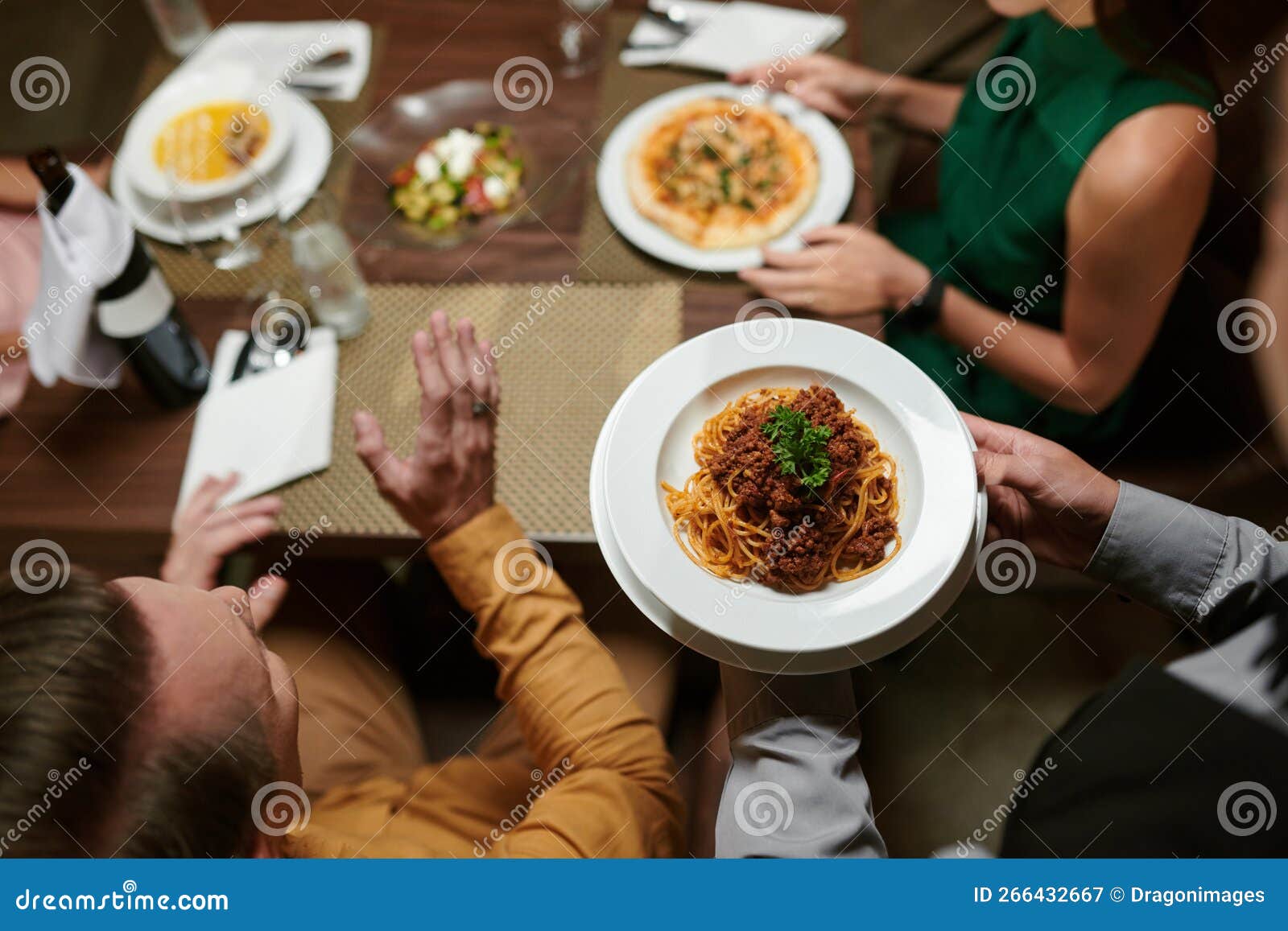 Waiter Serving Spaghetti Bolognese Stock Image - Image of guest, table ...