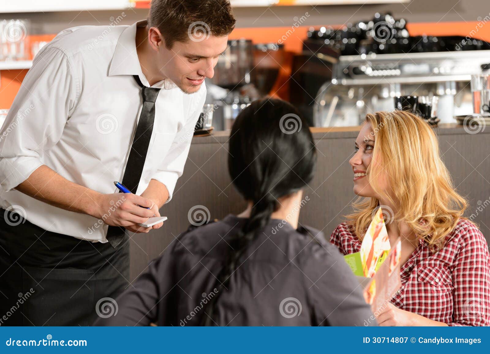Waiters Taking Orders waiter-taking-orders-in-a-restaurant-stock-photo-adobe-stock