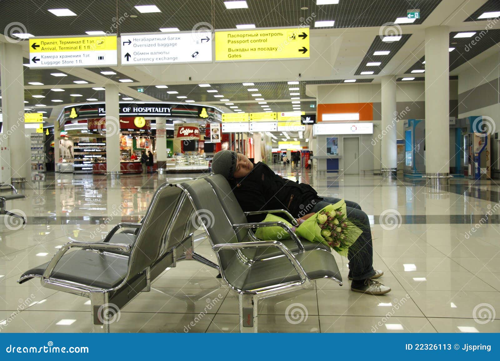 Waiting at the airport editorial stock photo. Image of bouquet 22326113