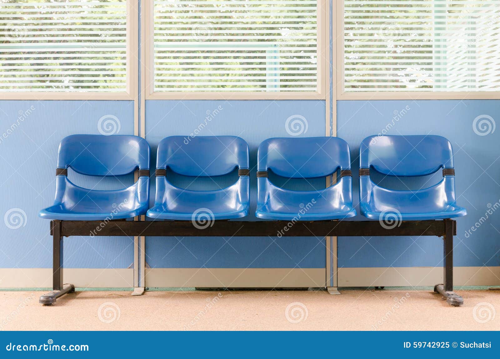 Waiting room blue chairs stock image. Image of carpet 59742925