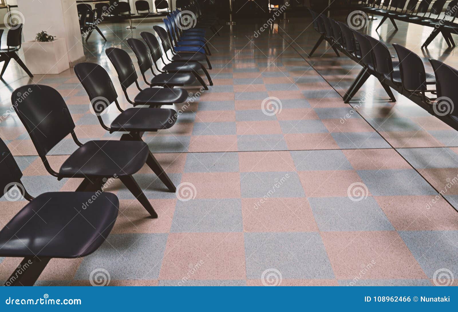 Waiting Room at the Railway Station with Empty Chairs Stock Photo