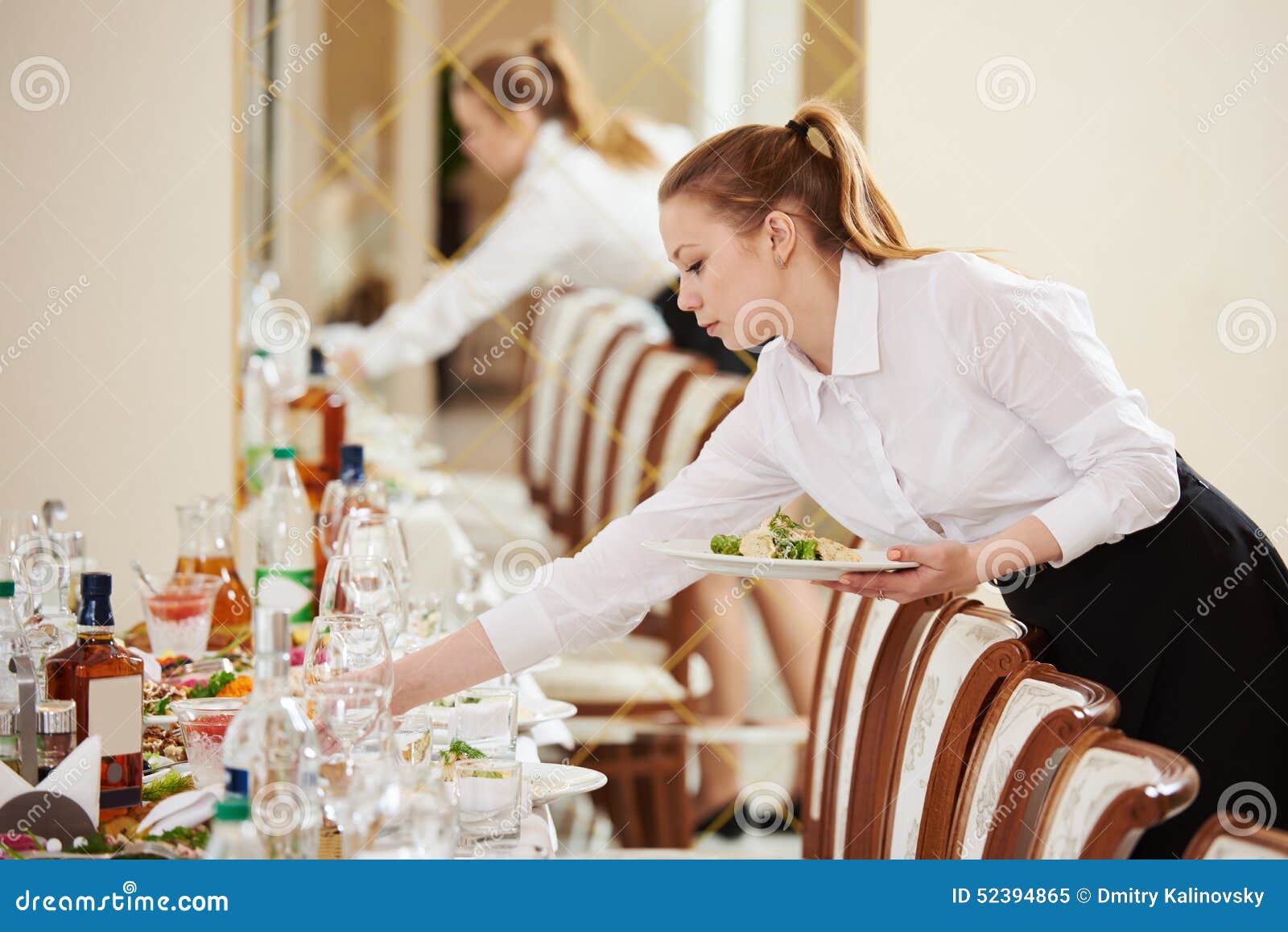 waitress at catering work in a restaurant