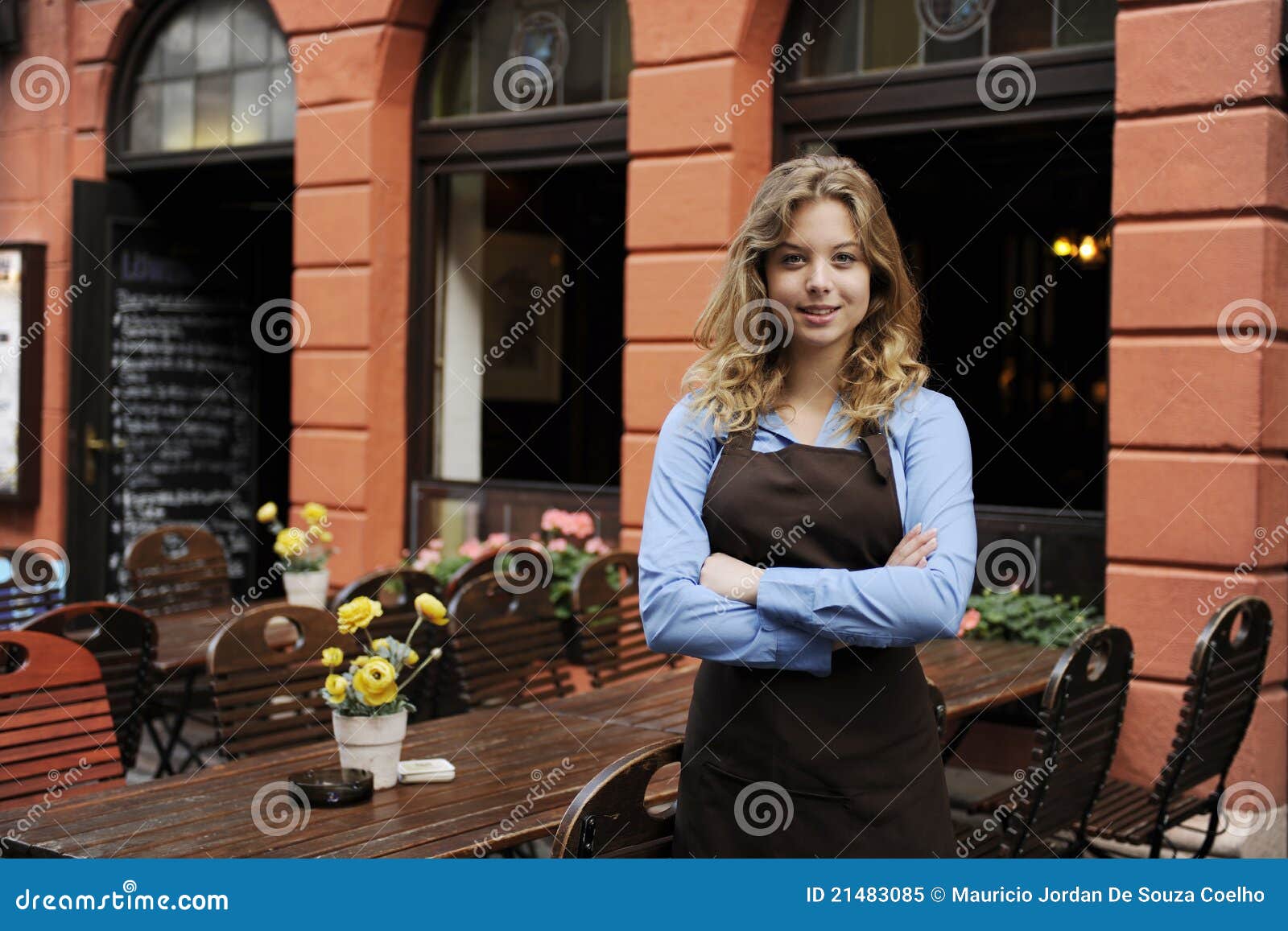 waitress in front of restaurant